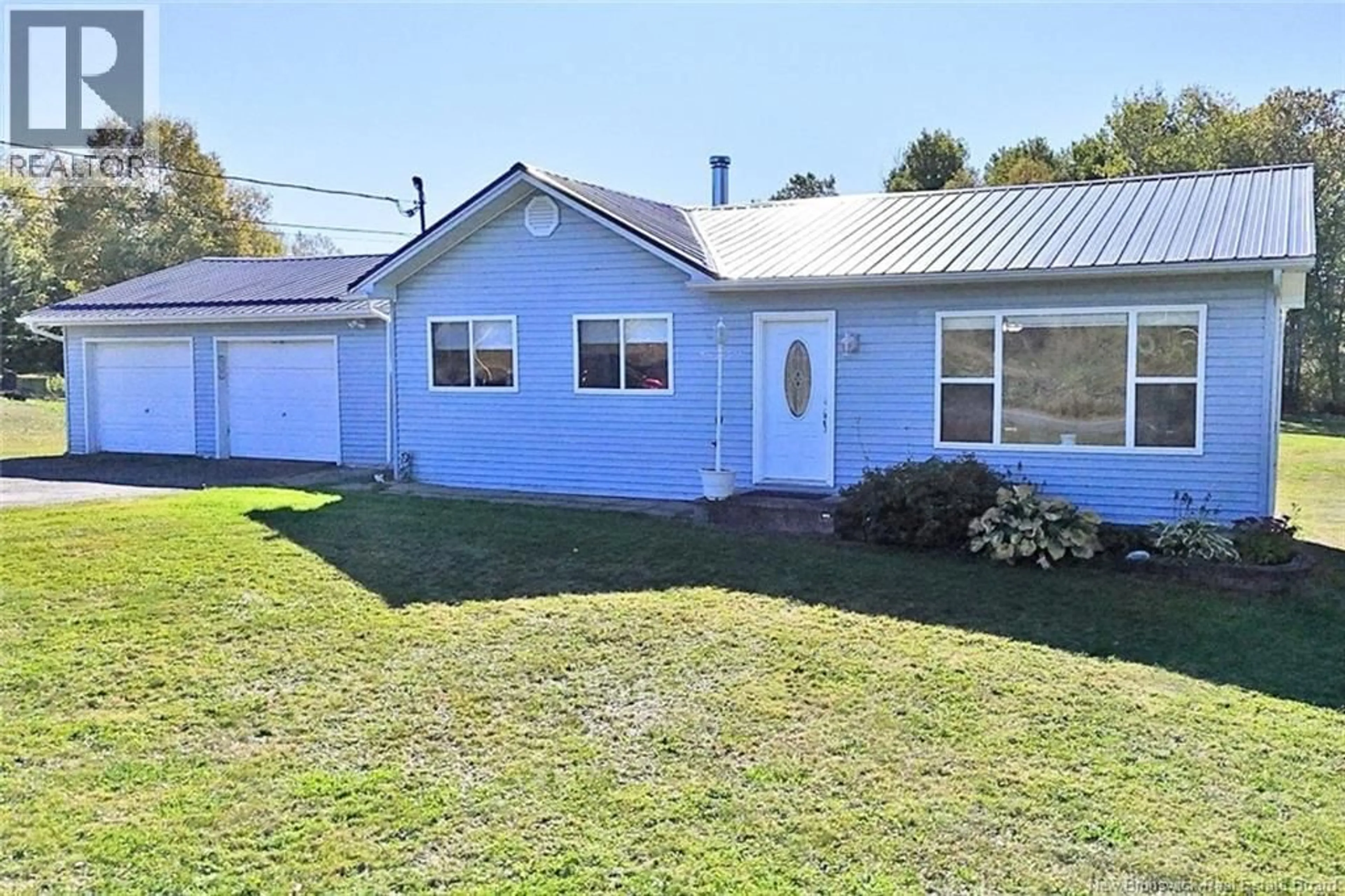A pic from outside/outdoor area/front of a property/back of a property/a pic from drone, street for 3247 ROUTE 585, Newbridge New Brunswick E7N1K2