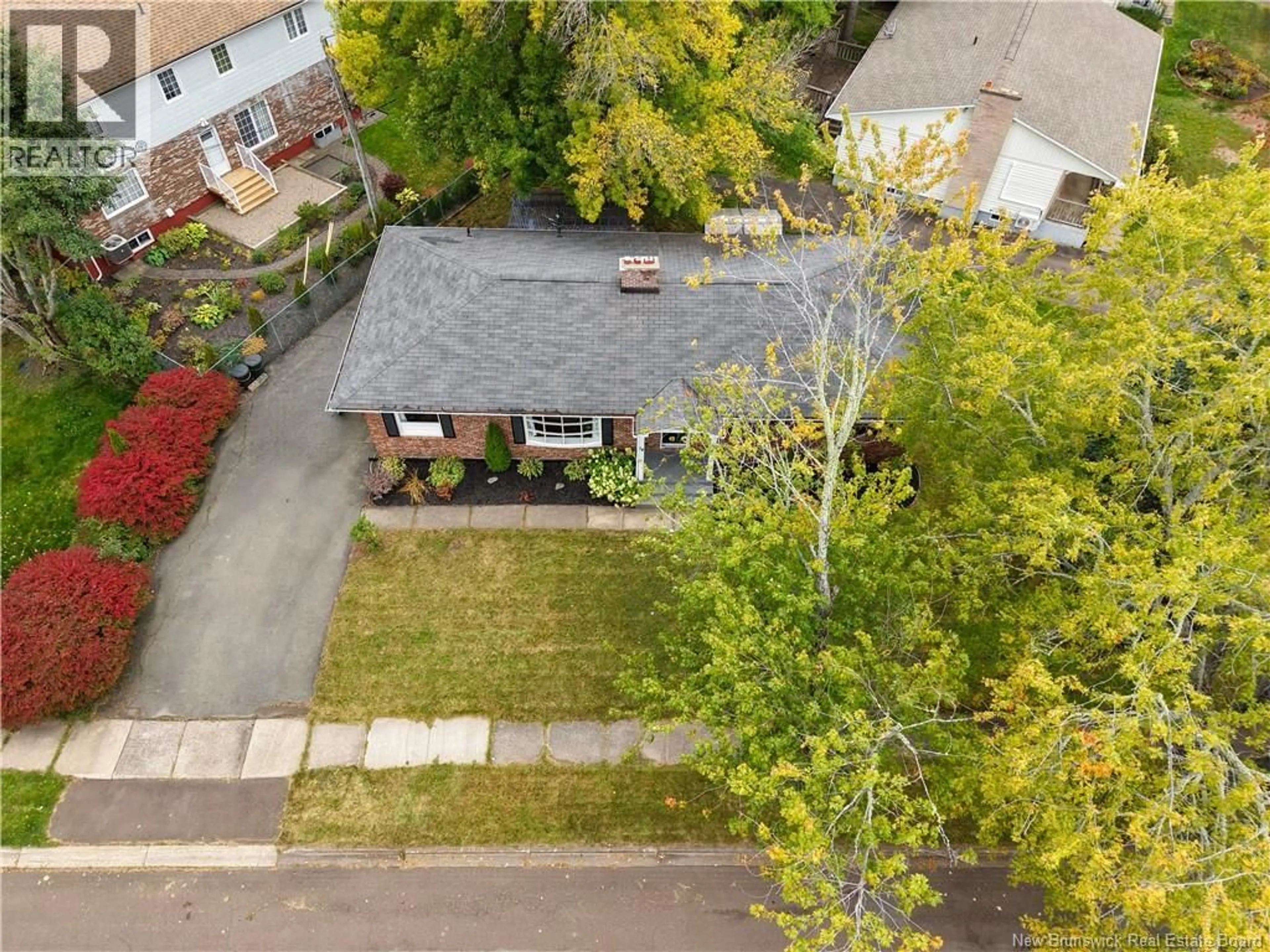 A pic from outside/outdoor area/front of a property/back of a property/a pic from drone, street for 14 LAIRD, Moncton New Brunswick E1E2P3