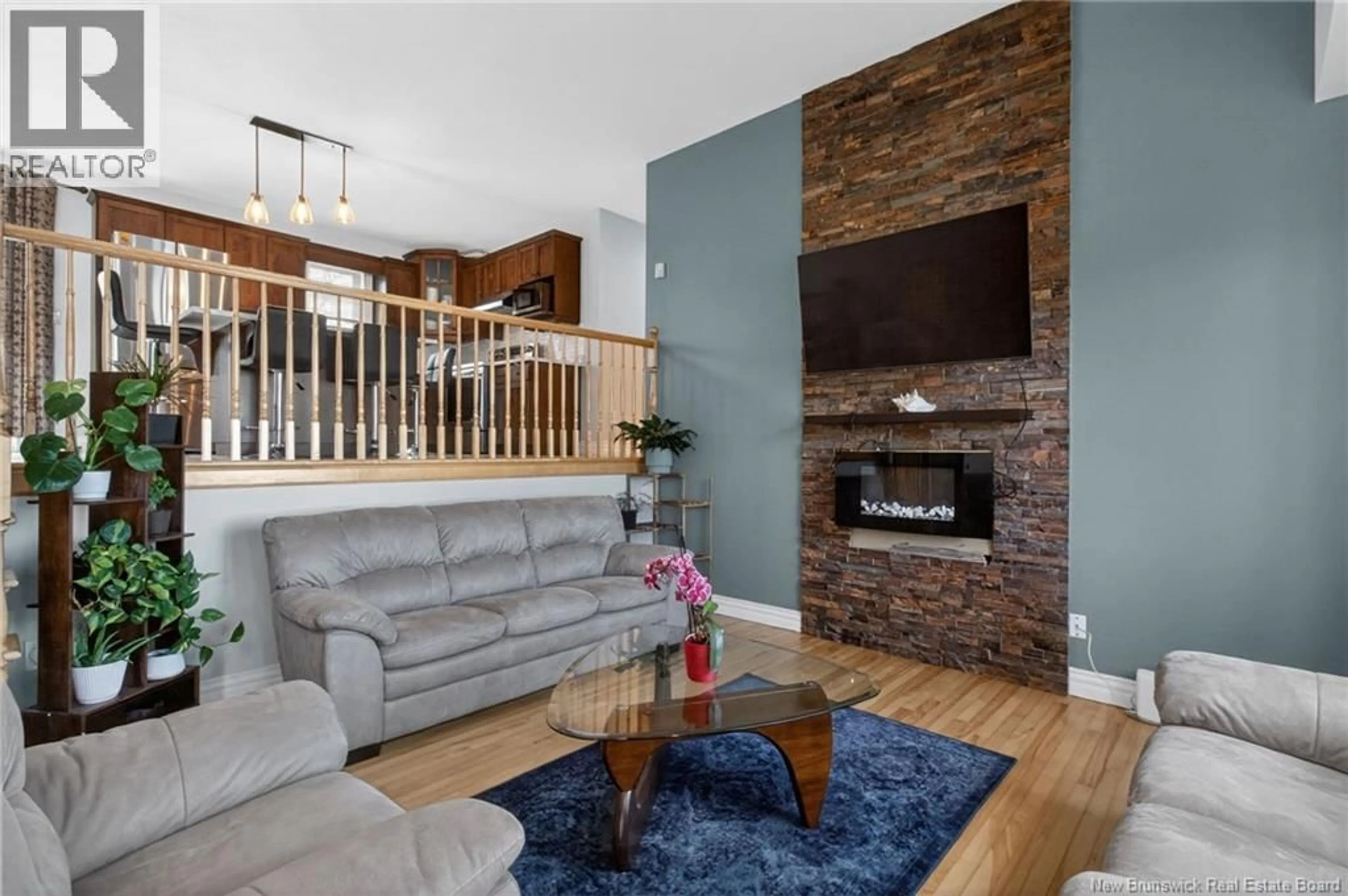 Living room with furniture, wood/laminate floor for 1 SEBASTIEN STREET, Shediac New Brunswick E4P0K7