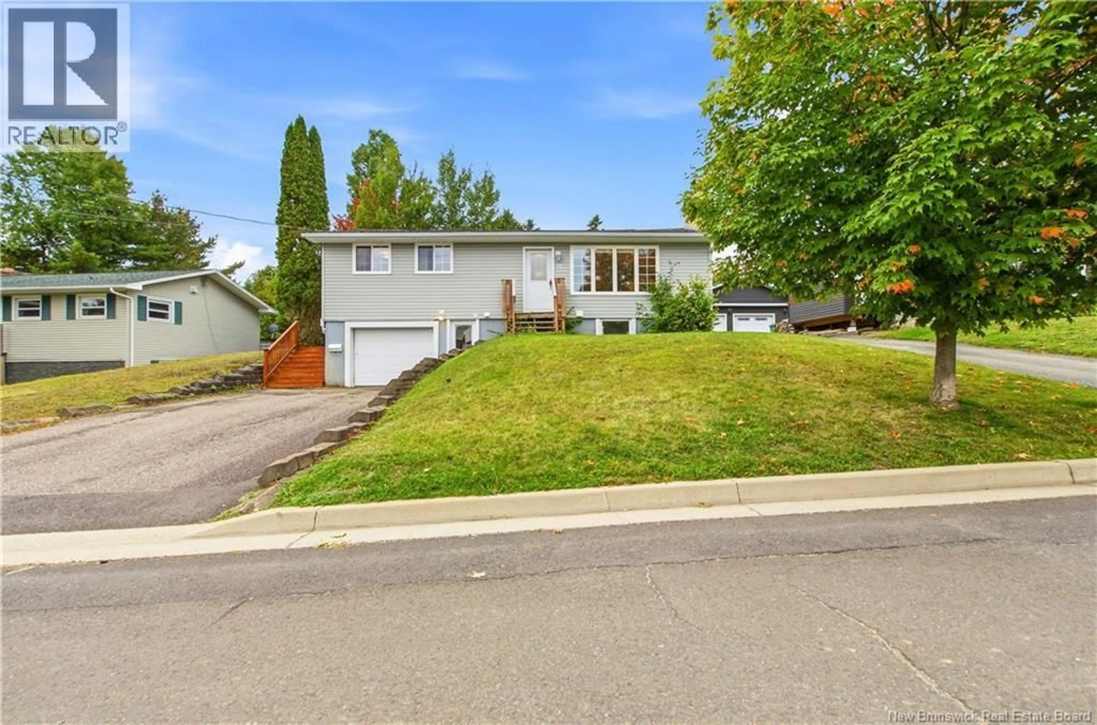 Home with vinyl exterior material, street for 17 HOLLYBROOK STREET, Marysville New Brunswick E3A4N8