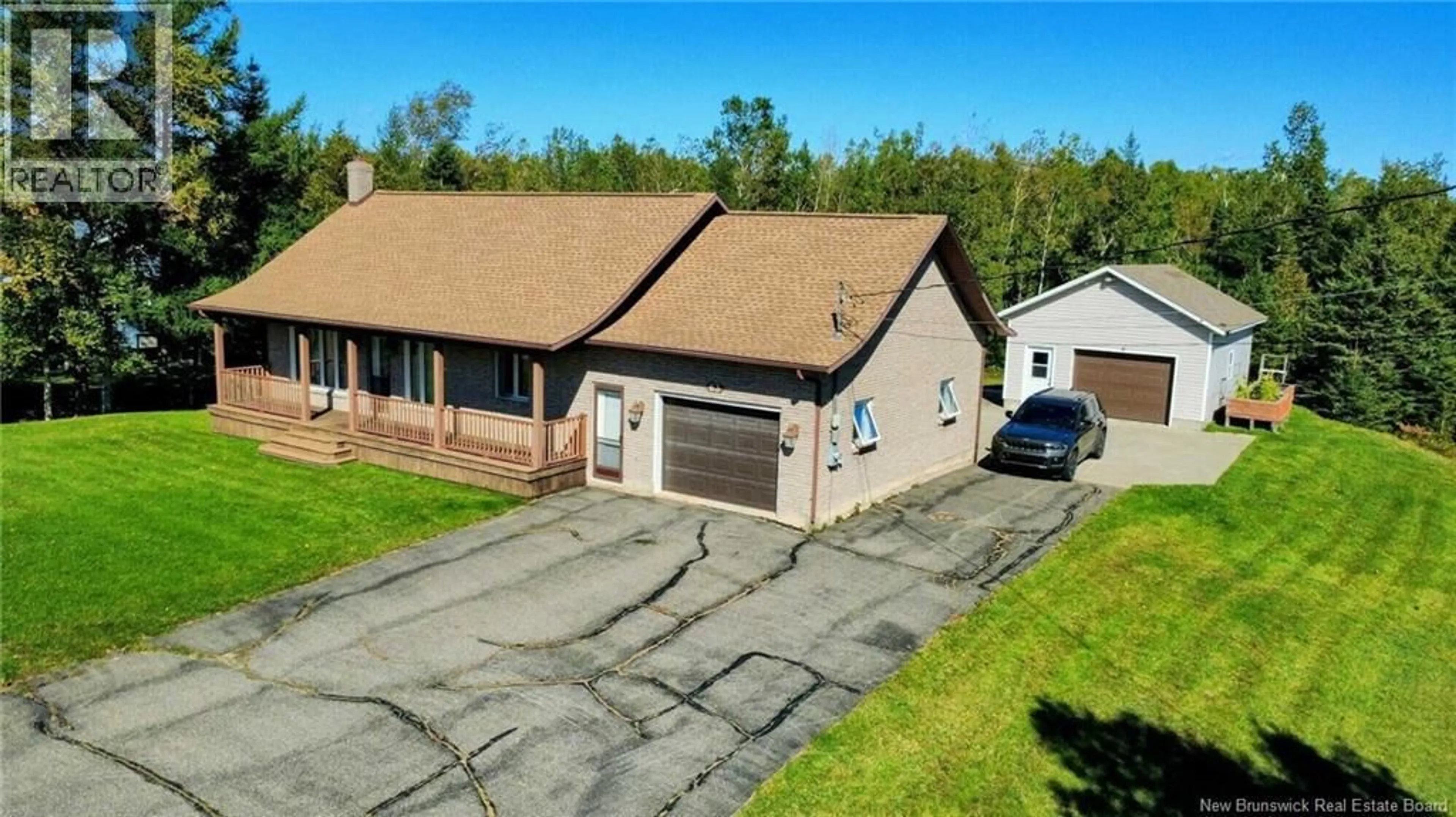 A pic from outside/outdoor area/front of a property/back of a property/a pic from drone, street for 63 CHEMIN ST SIMON, Caraquet New Brunswick E1W1B3
