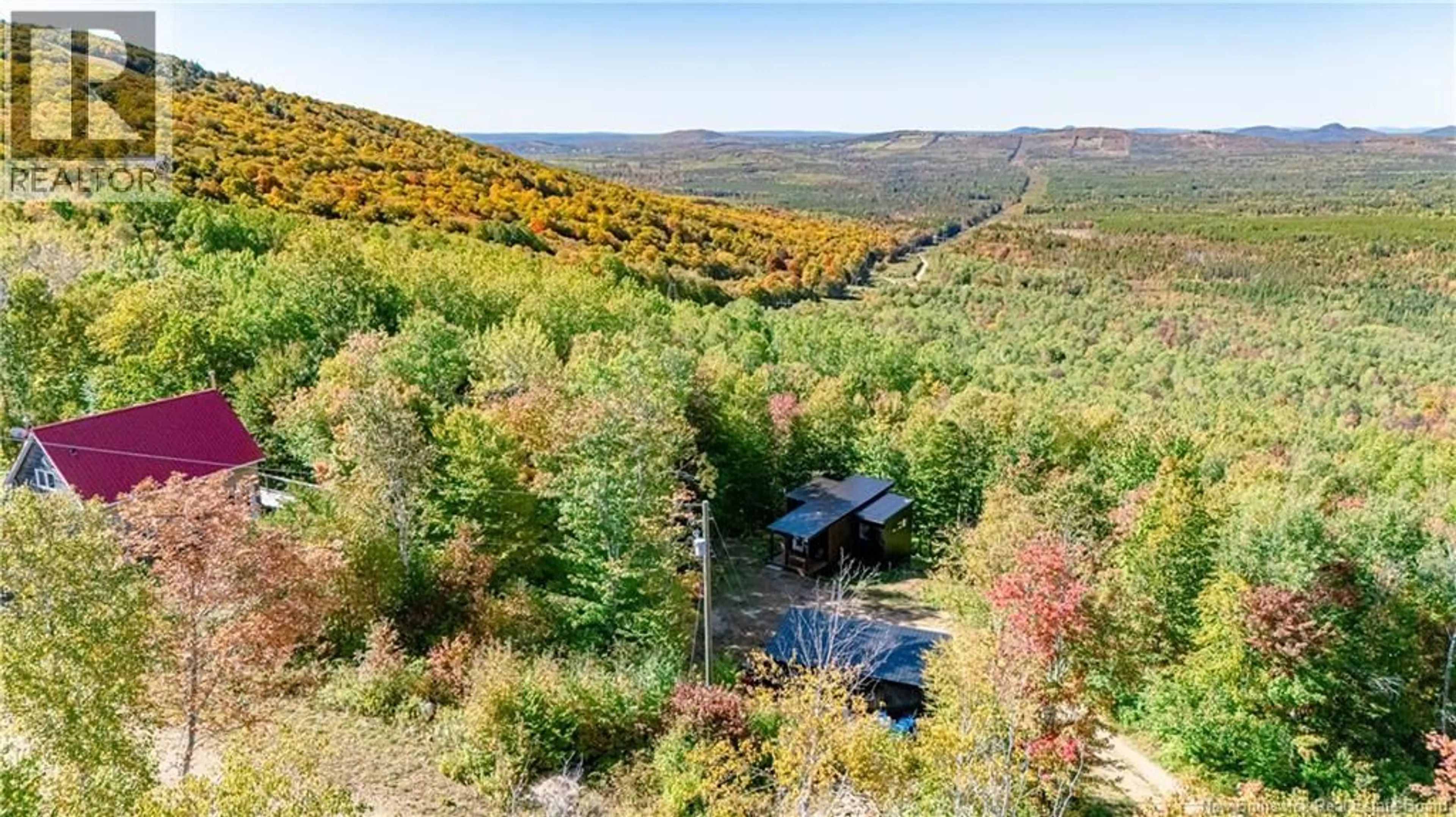A pic from outside/outdoor area/front of a property/back of a property/a pic from drone, forest/trees view for 149 SKIERS LANE, Hainesville New Brunswick E6E2B8