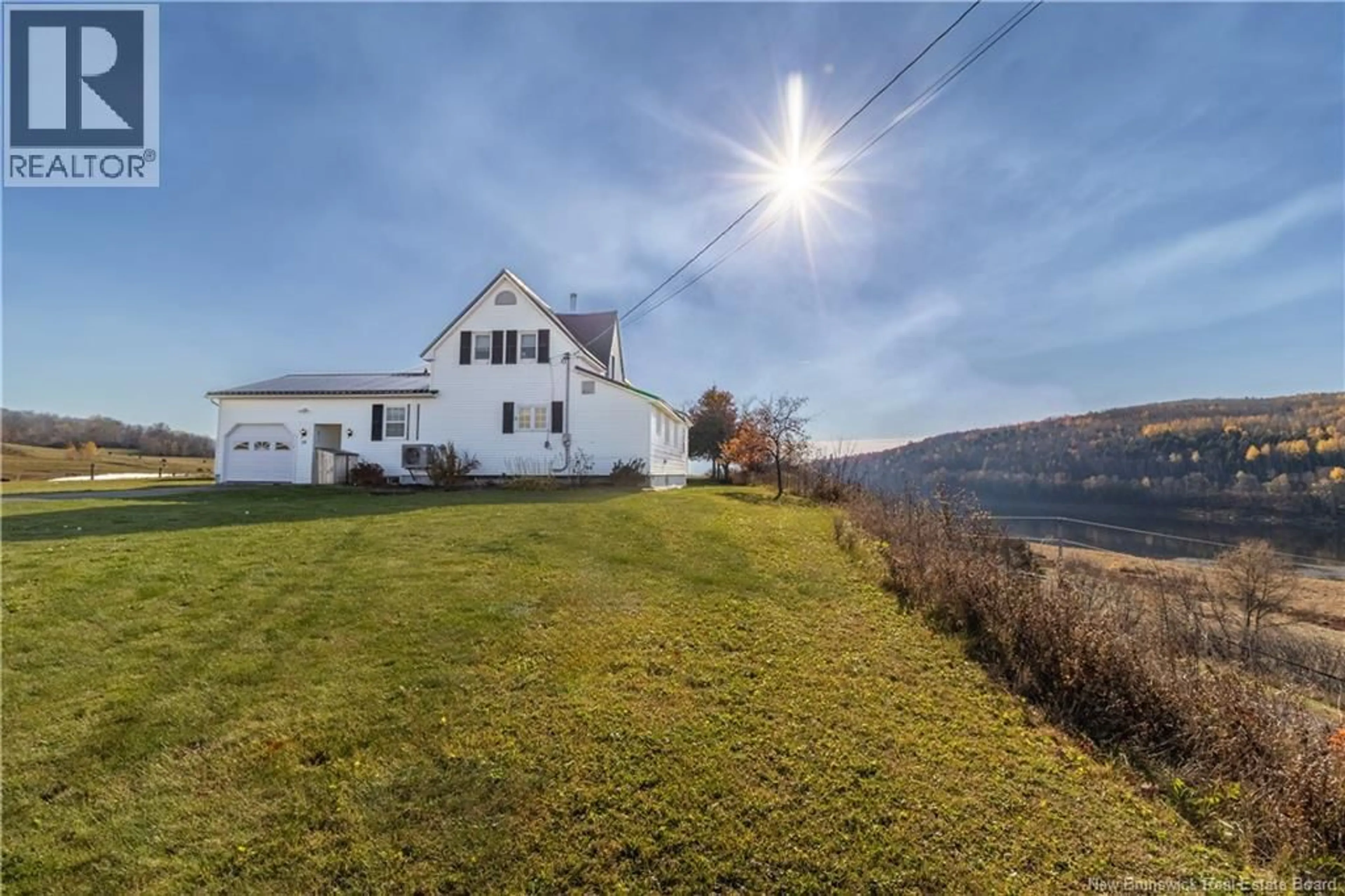 A pic from outside/outdoor area/front of a property/back of a property/a pic from drone, water/lake/river/ocean view for 10 CLARENCE HUNTER LANE, Riverbank New Brunswick E7L4E9