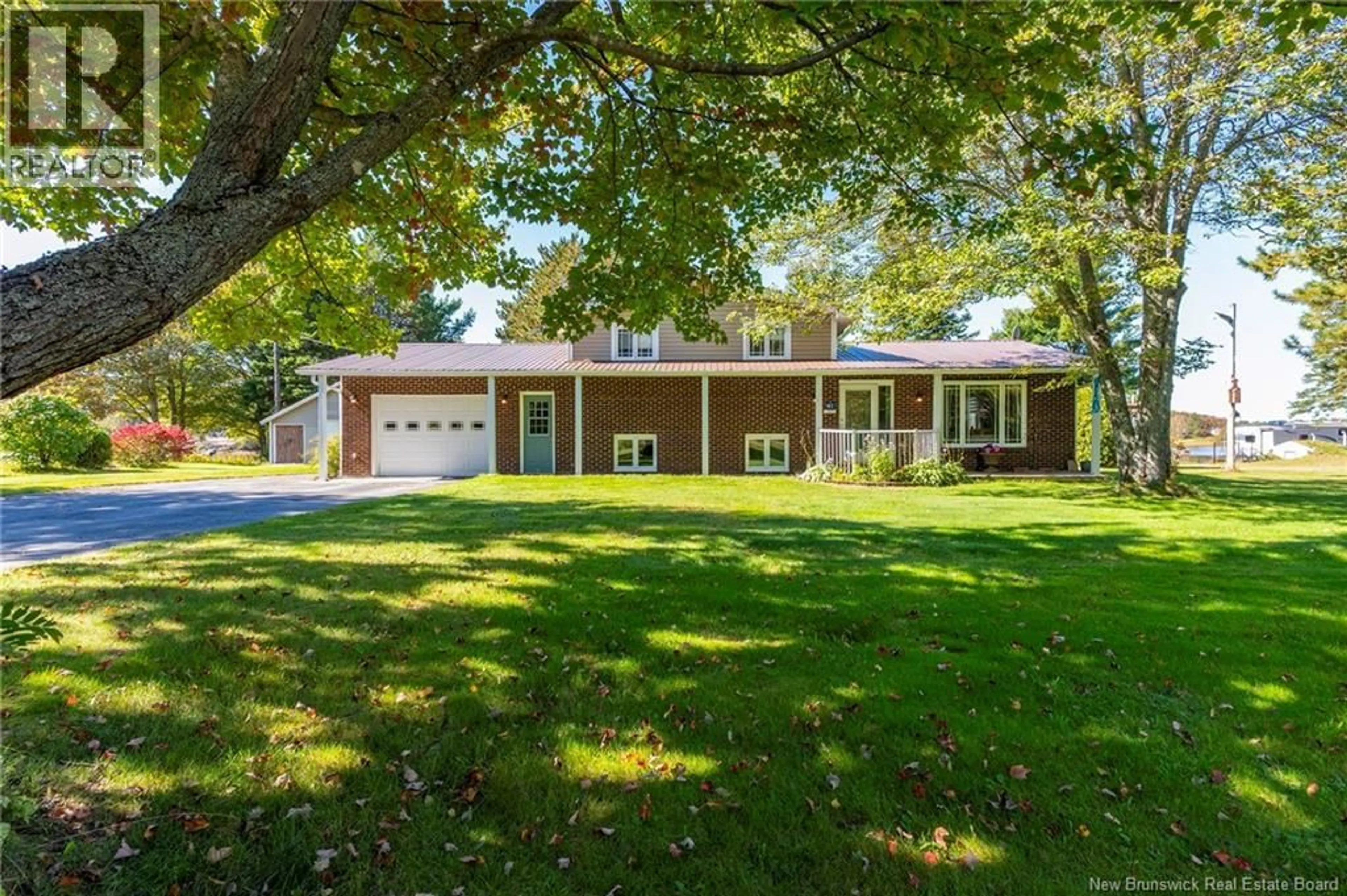 Home with vinyl exterior material, street for 41 MANUEL, Baie-Sainte-Anne New Brunswick E9A1G3