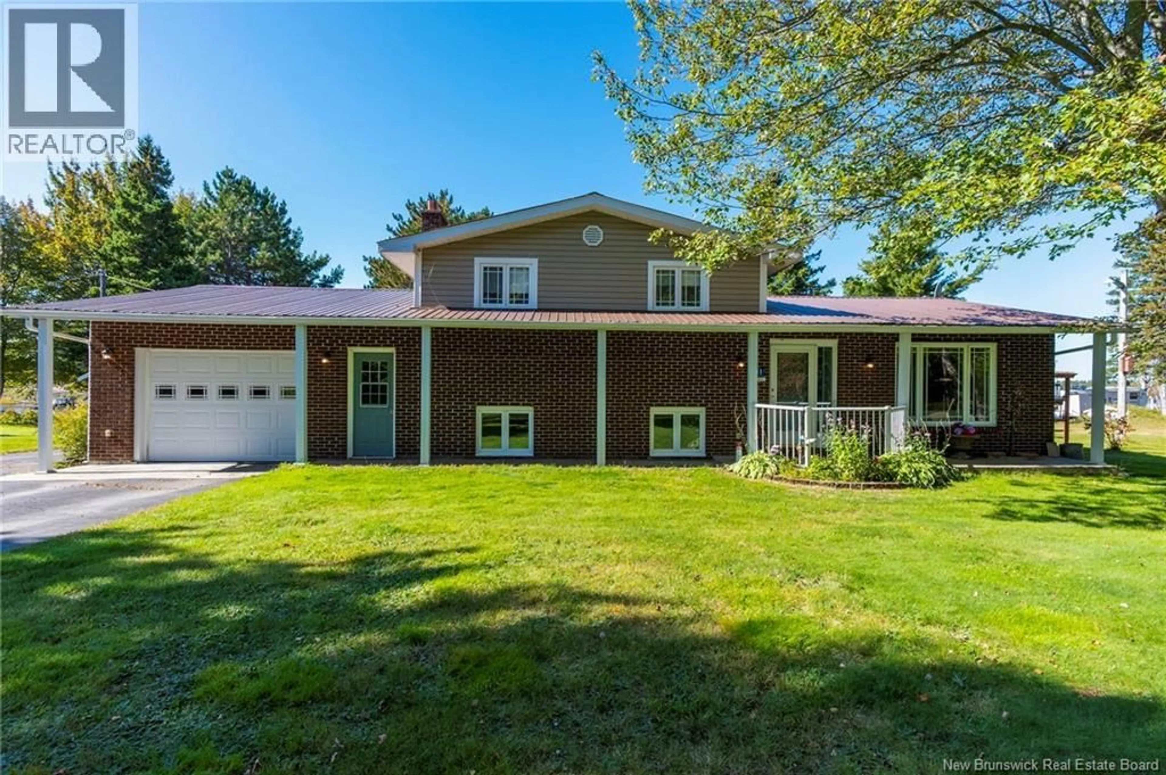 Home with vinyl exterior material, street for 41 MANUEL, Baie-Sainte-Anne New Brunswick E9A1G3