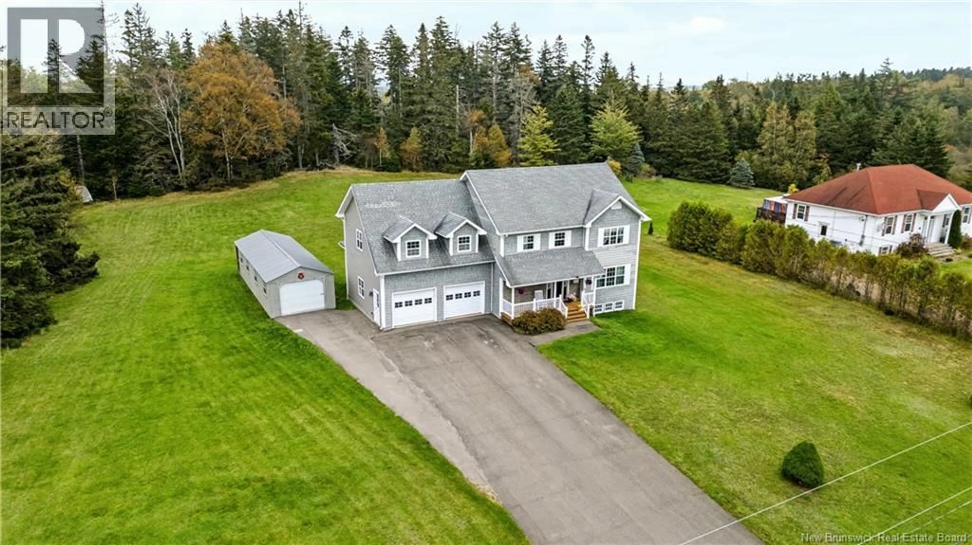 A pic from outside/outdoor area/front of a property/back of a property/a pic from drone, unknown for 39 RIDGEWOOD DRIVE, Sackville New Brunswick E4L4T5