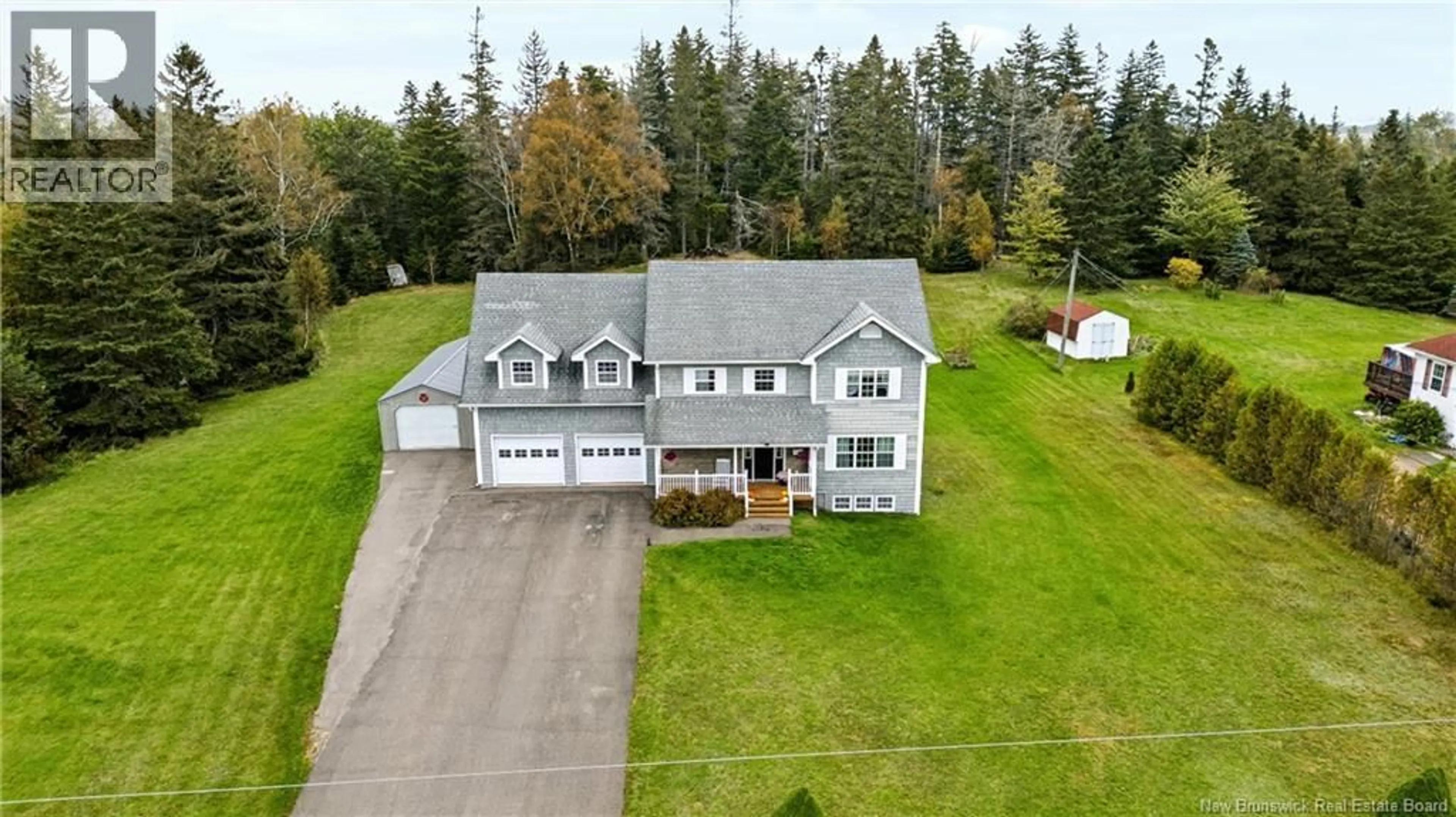 A pic from outside/outdoor area/front of a property/back of a property/a pic from drone, unknown for 39 RIDGEWOOD DRIVE, Sackville New Brunswick E4L4T5