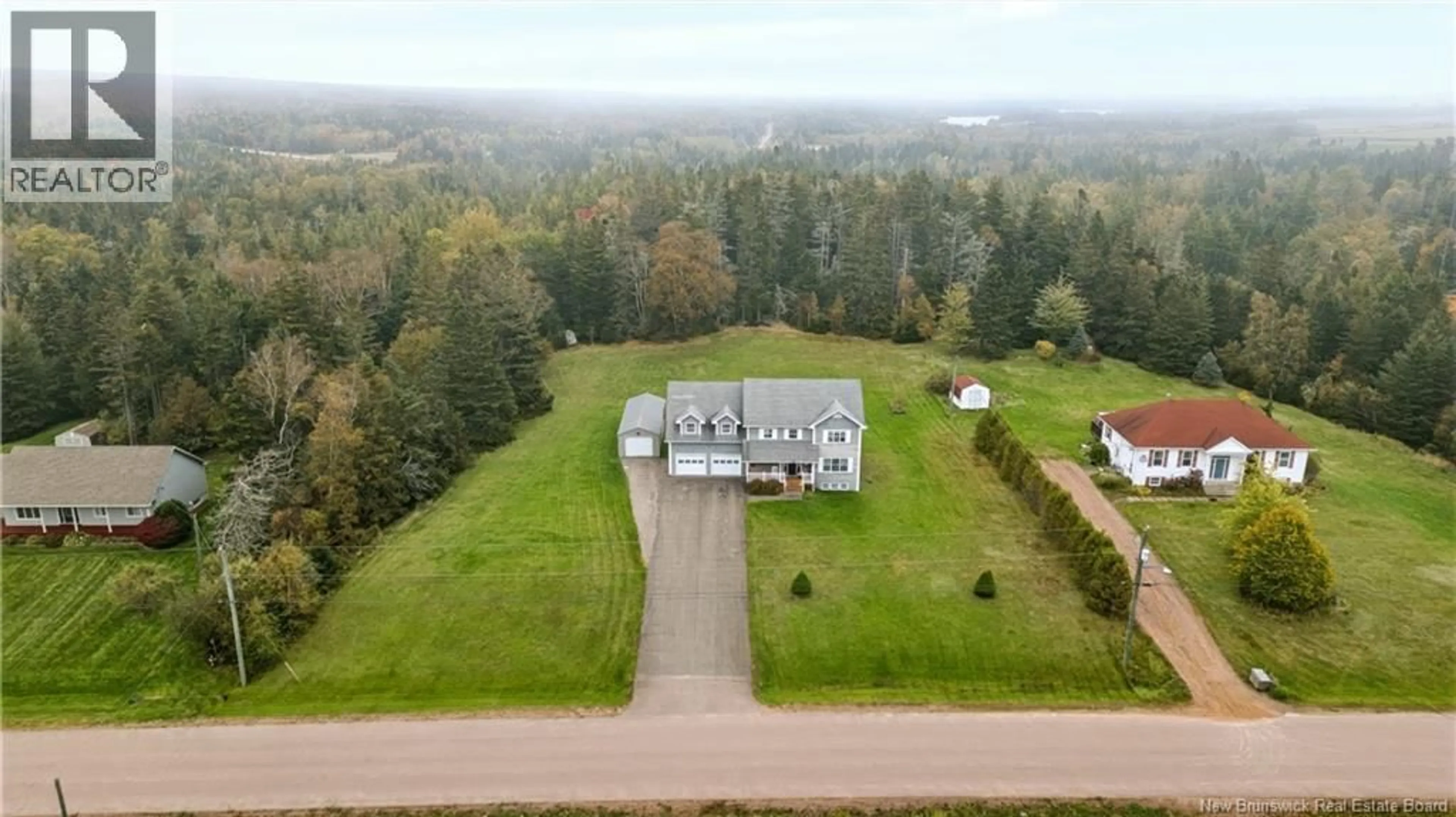 A pic from outside/outdoor area/front of a property/back of a property/a pic from drone, unknown for 39 RIDGEWOOD DRIVE, Sackville New Brunswick E4L4T5