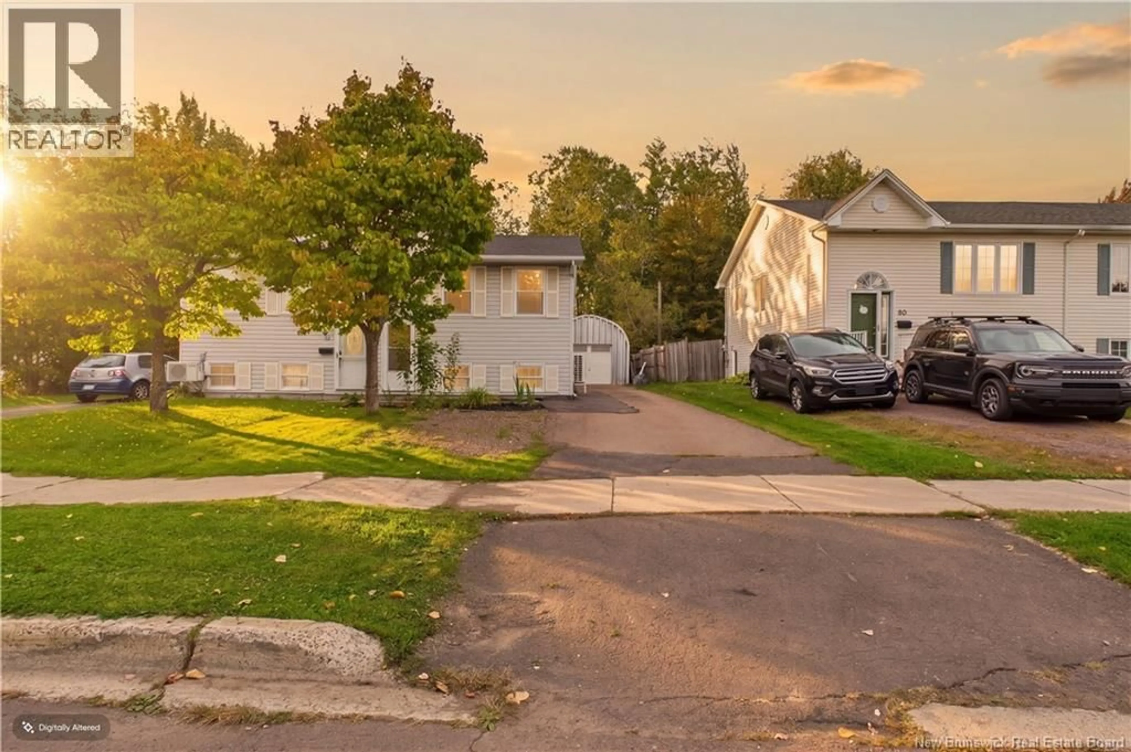 A pic from outside/outdoor area/front of a property/back of a property/a pic from drone, street for 84 GLENCOE DRIVE, Moncton New Brunswick E1A6P6
