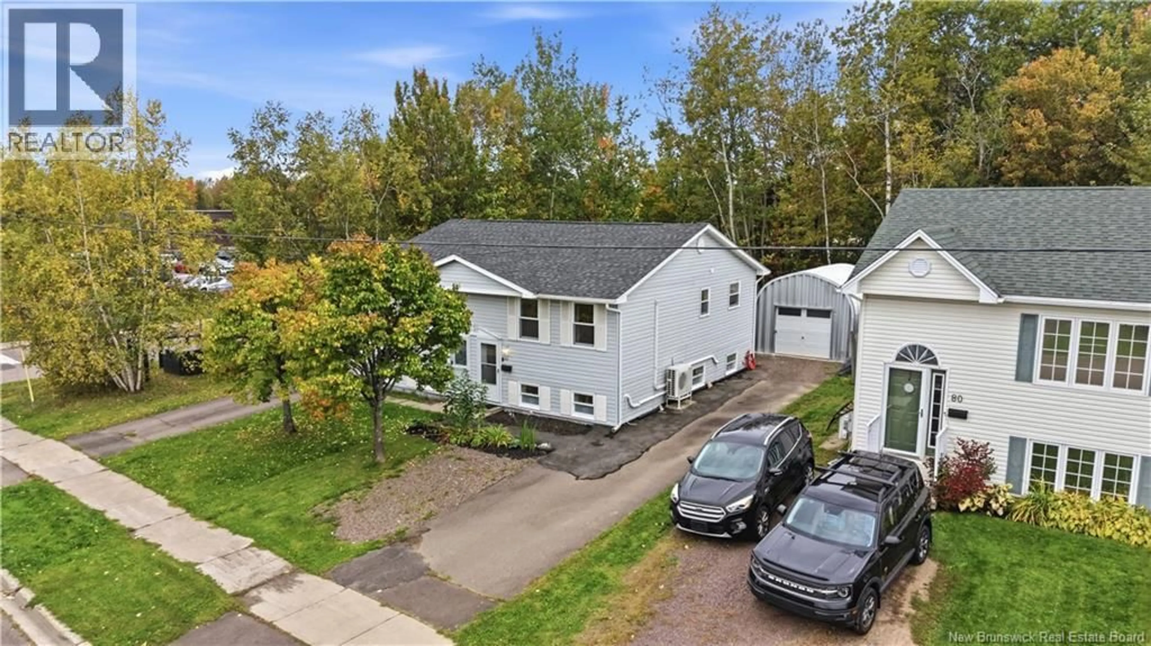 A pic from outside/outdoor area/front of a property/back of a property/a pic from drone, street for 84 GLENCOE DRIVE, Moncton New Brunswick E1A6P6