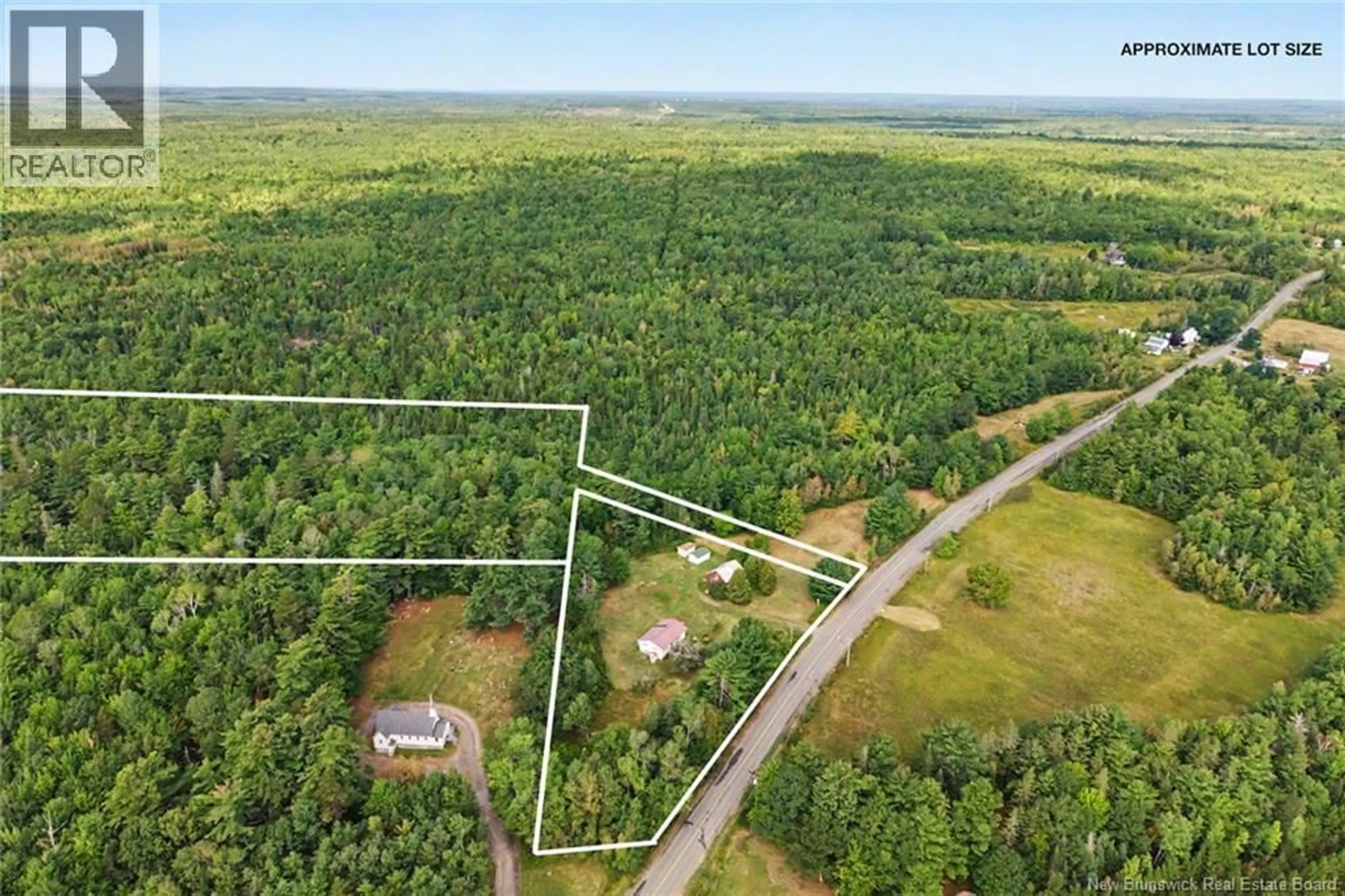 A pic from outside/outdoor area/front of a property/back of a property/a pic from drone, forest/trees view for 2086 ROUTE 102, Gagetown New Brunswick E5M1L2
