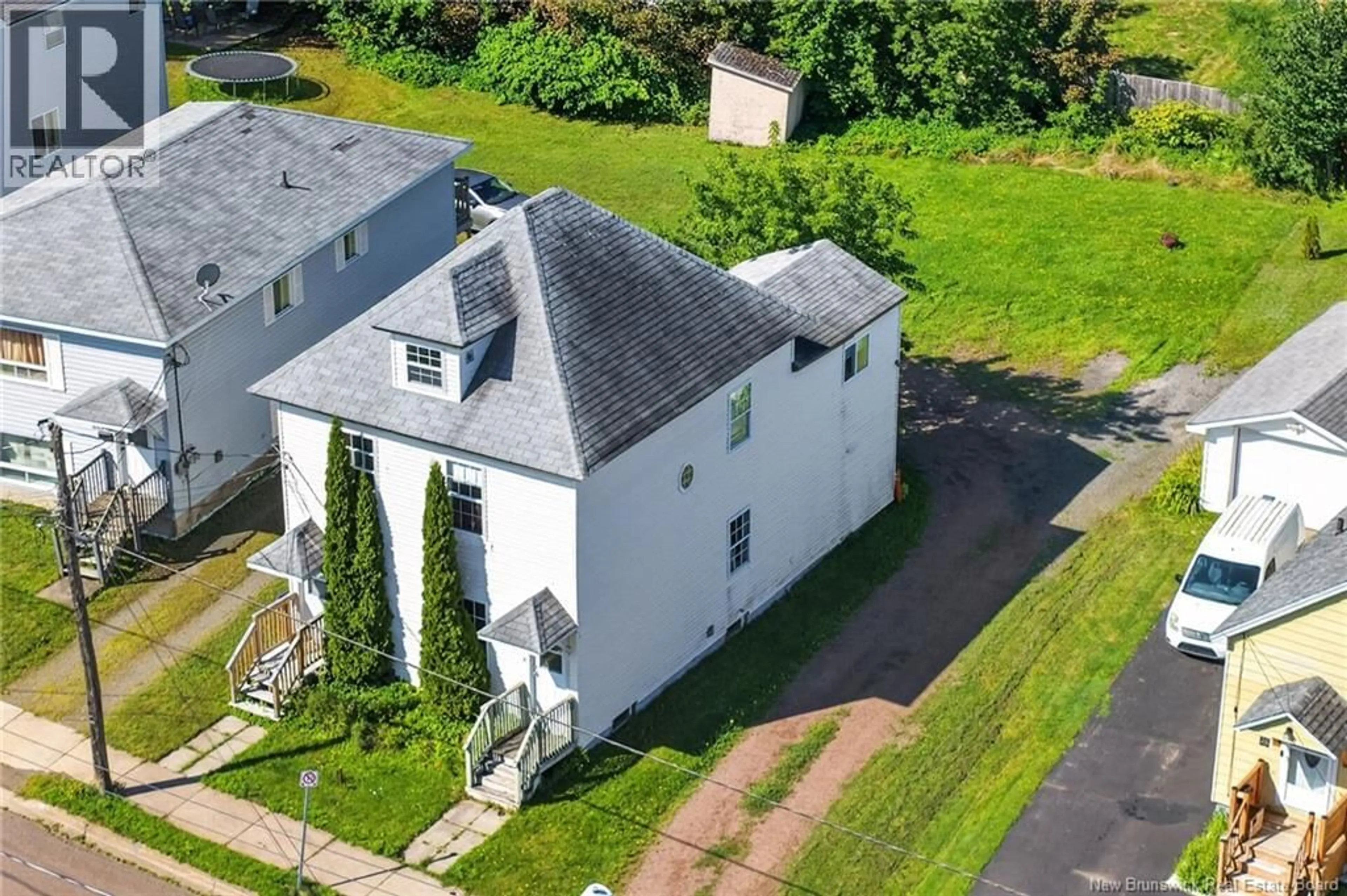 A pic from outside/outdoor area/front of a property/back of a property/a pic from drone, building for 90-92 EDWARD STREET, Moncton New Brunswick E1A3Y9