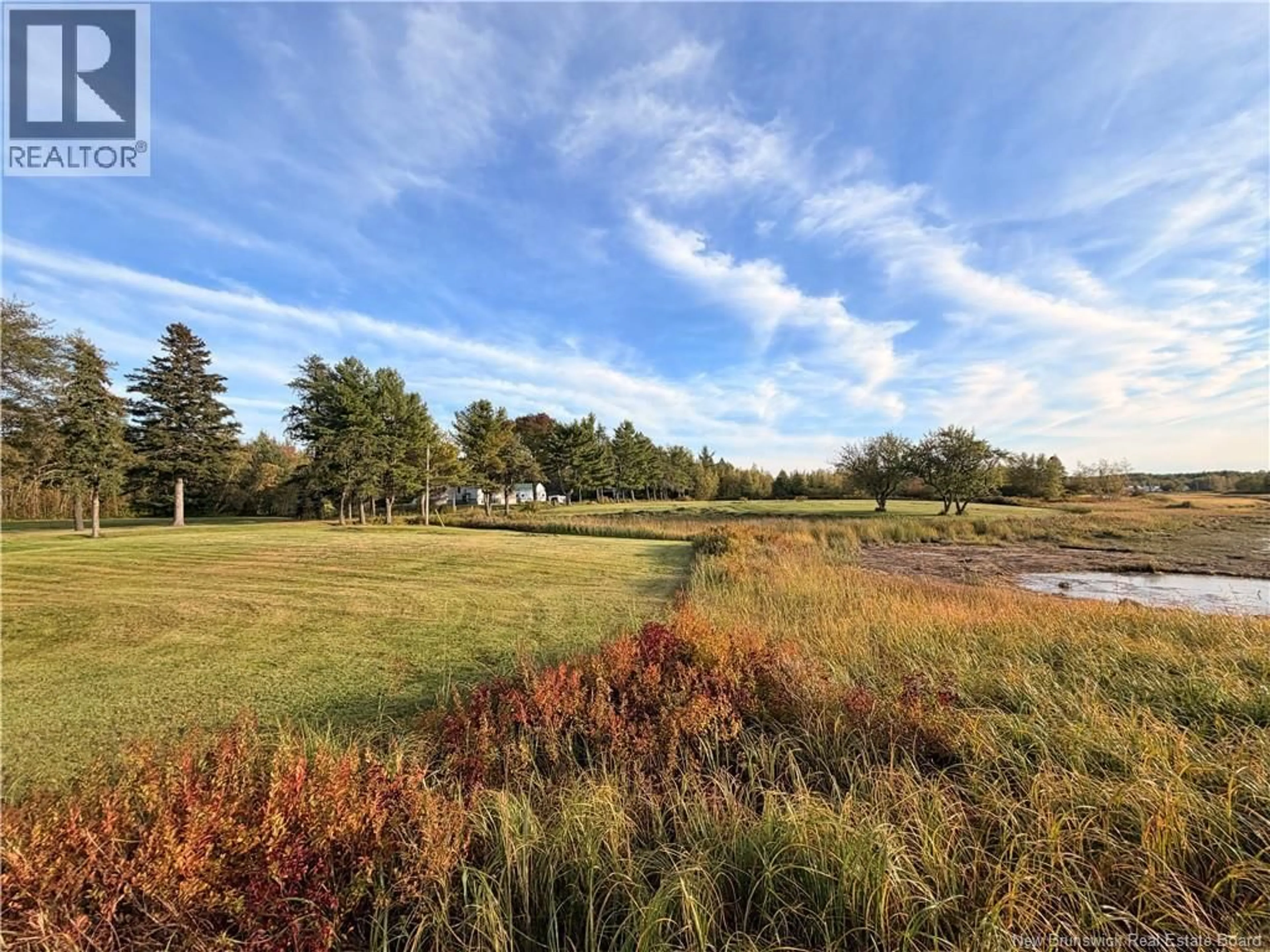 A pic from outside/outdoor area/front of a property/back of a property/a pic from drone, water/lake/river/ocean view for 418 POINT AUX CARR ROAD, Miramichi New Brunswick E1N4X7