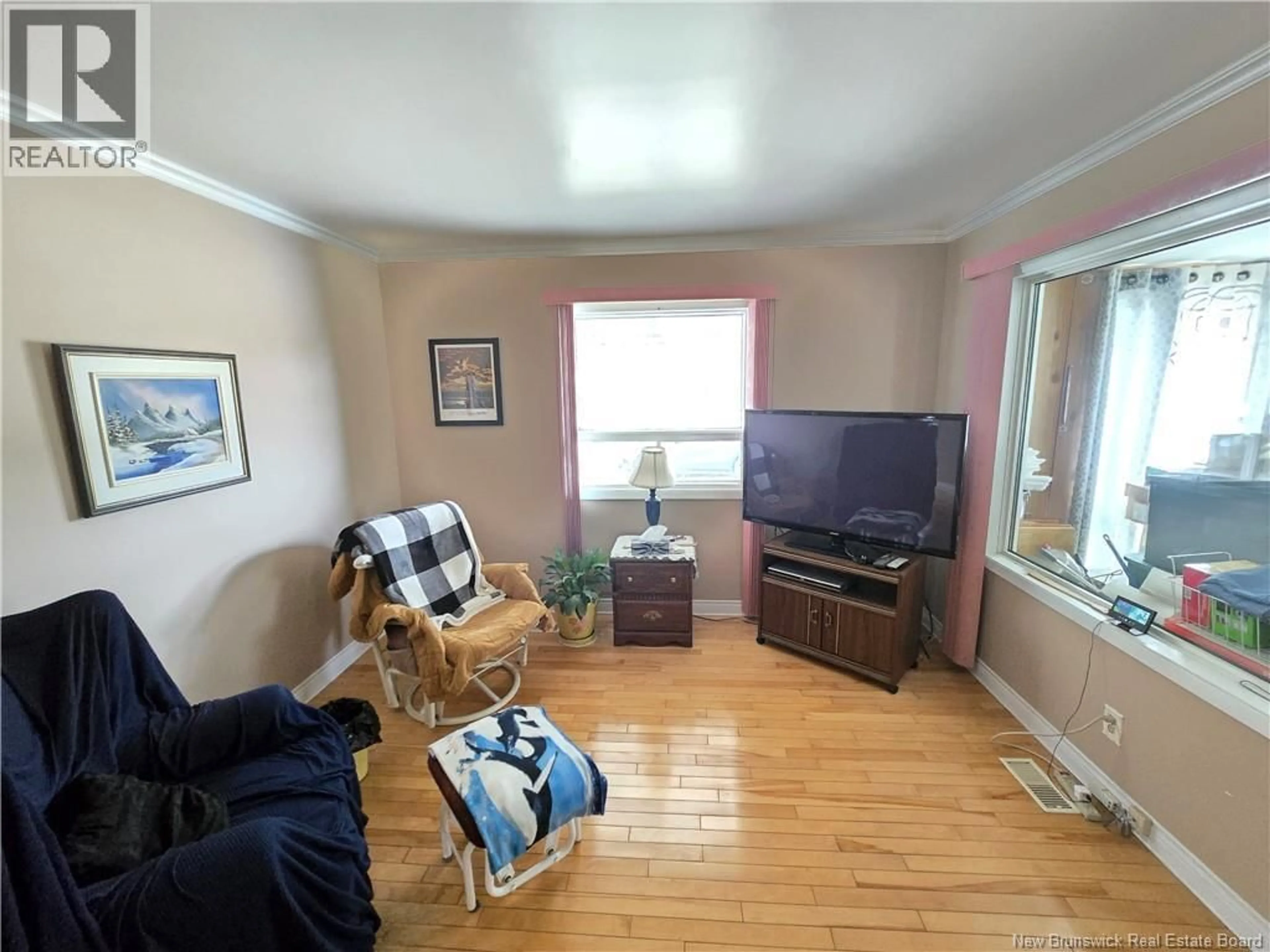 Living room with furniture, wood/laminate floor for 57 GLOUCESTER JUNCTION, Gloucester Junction New Brunswick E2A6H3