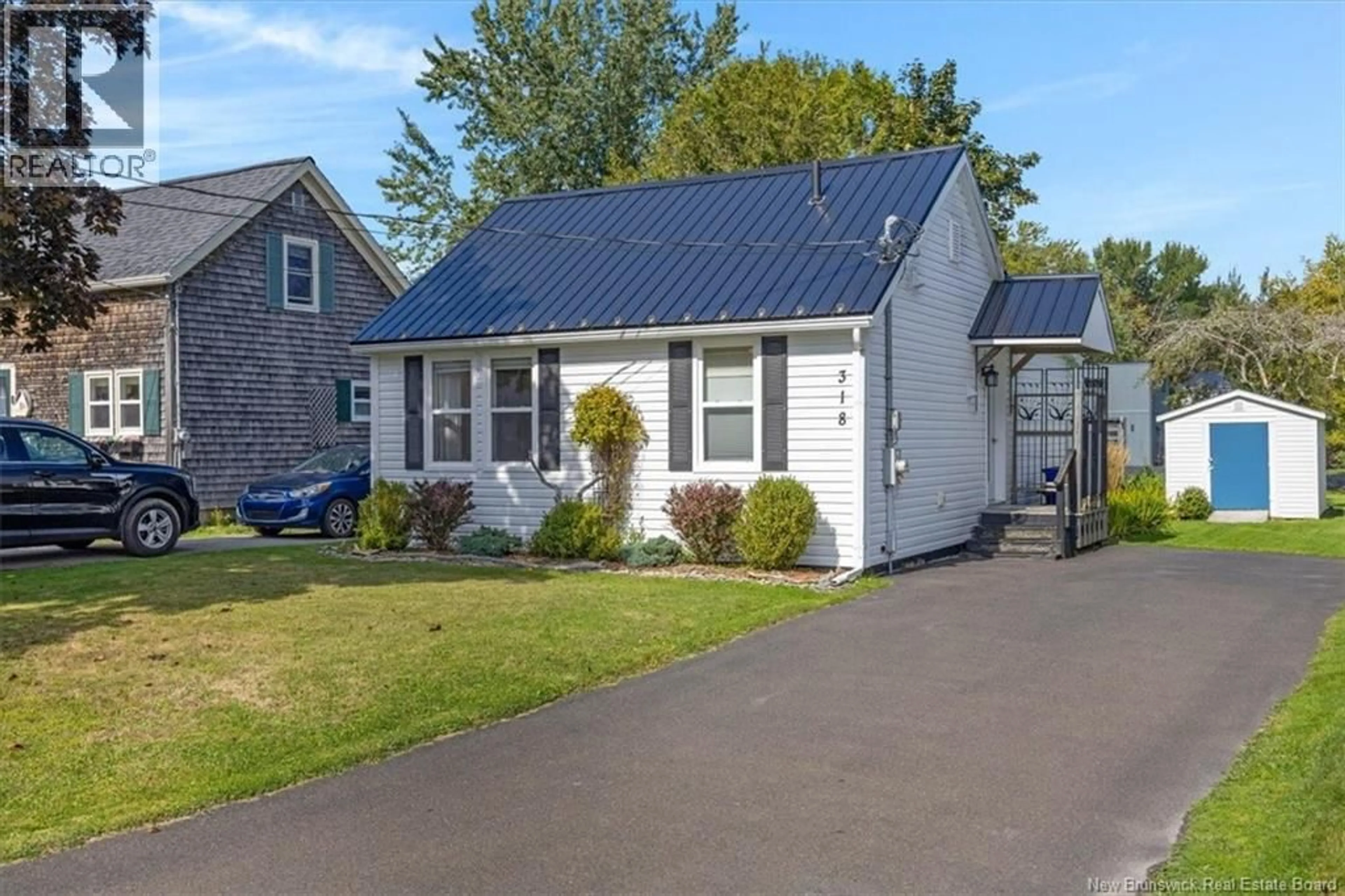 Home with vinyl exterior material, street for 318 PARR STREET, Saint Andrews New Brunswick E5B1M6