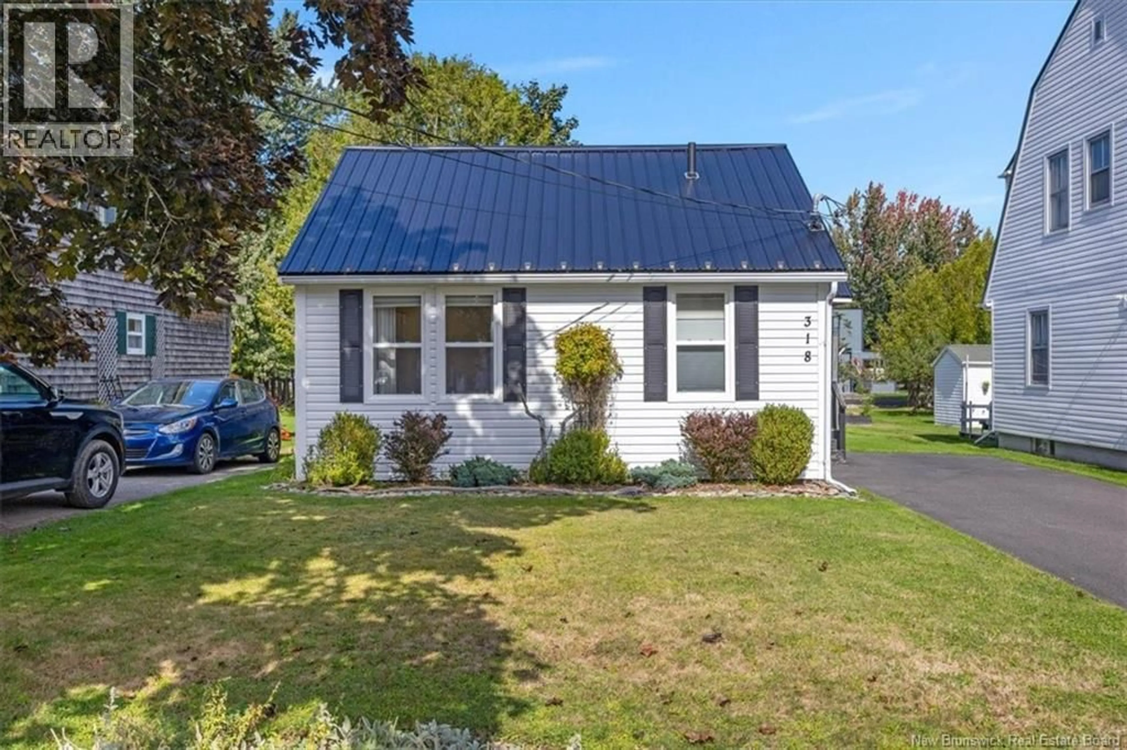 Home with vinyl exterior material, street for 318 PARR STREET, Saint Andrews New Brunswick E5B1M6
