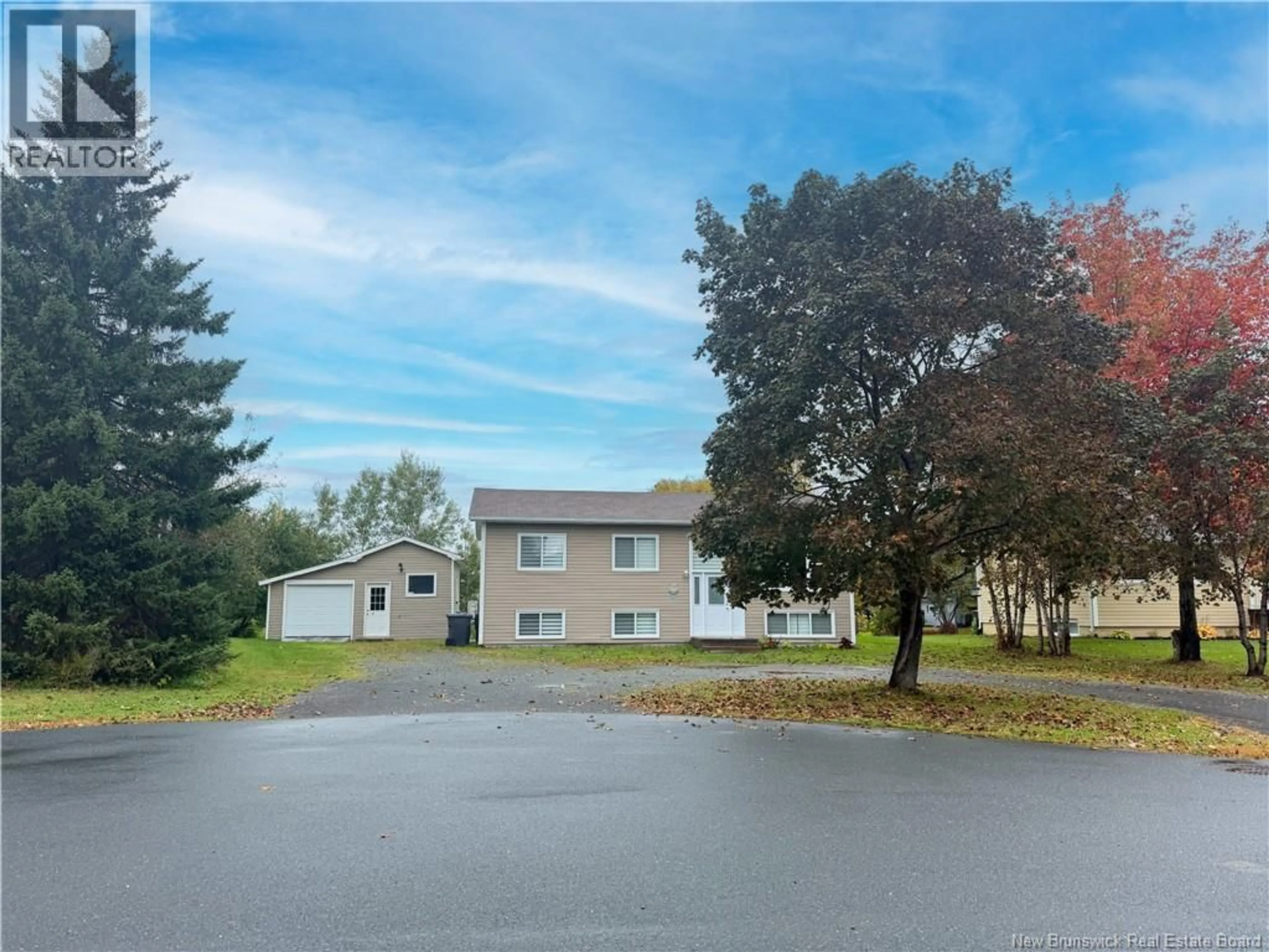 A pic from outside/outdoor area/front of a property/back of a property/a pic from drone, unknown for 214 MAURICE CRESCENT, Beresford New Brunswick E8K1L4