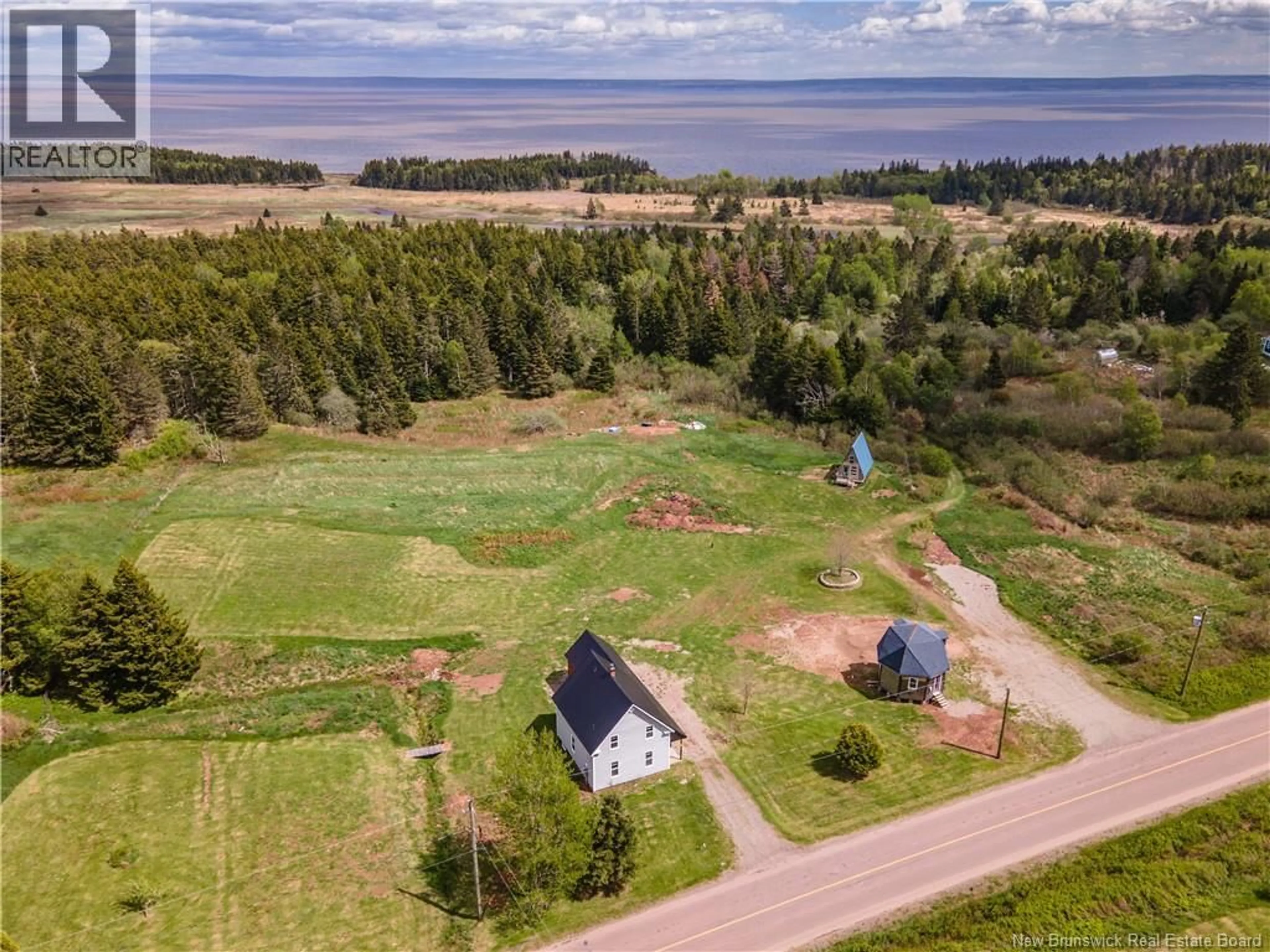 A pic from outside/outdoor area/front of a property/back of a property/a pic from drone, water/lake/river/ocean view for 1195 ROUTE 915, New Horton New Brunswick E4H1W4