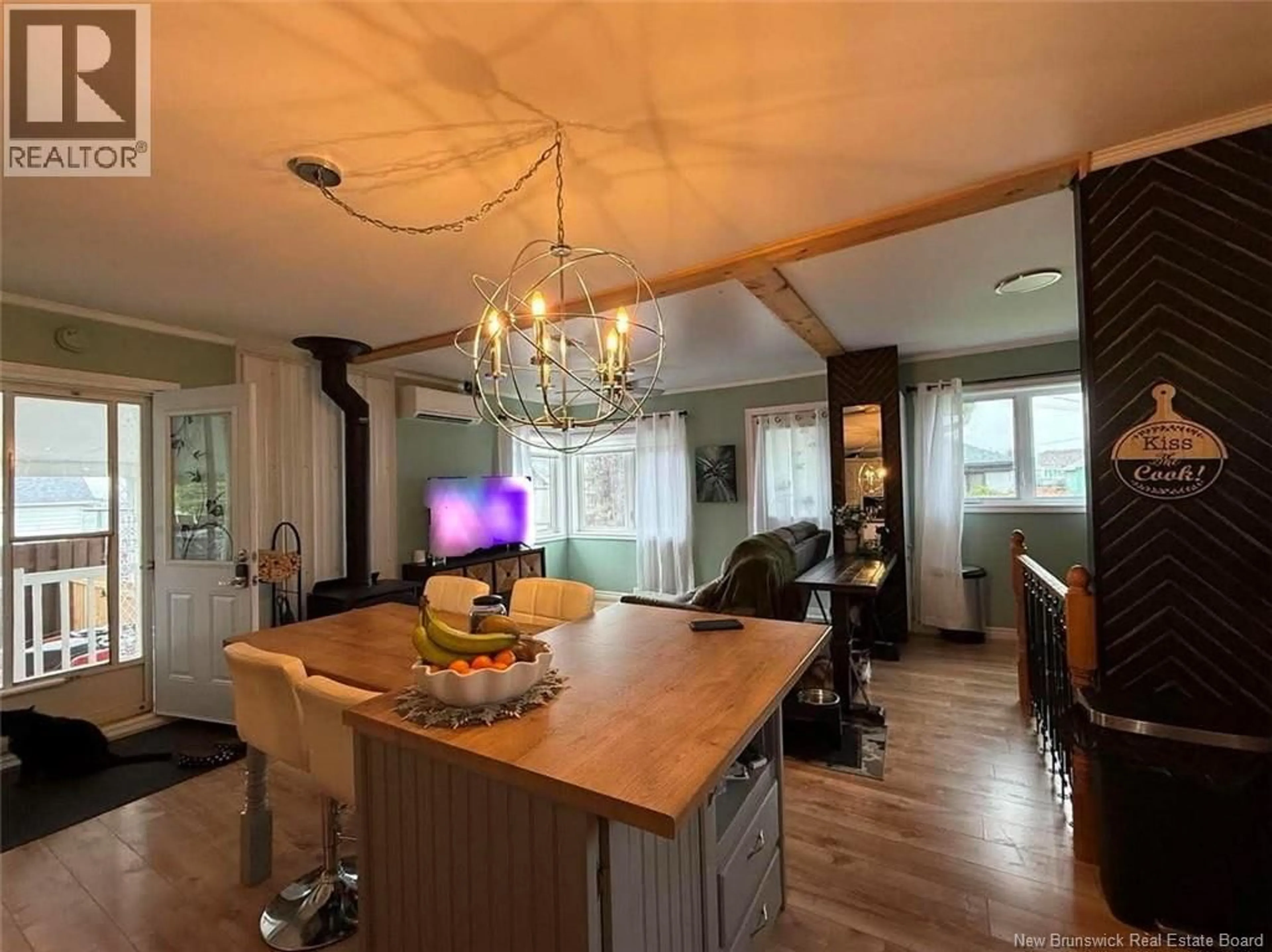 Open concept kitchen, wood/laminate floor for 129 34TH AVENUE, Edmundston New Brunswick E3V2T4