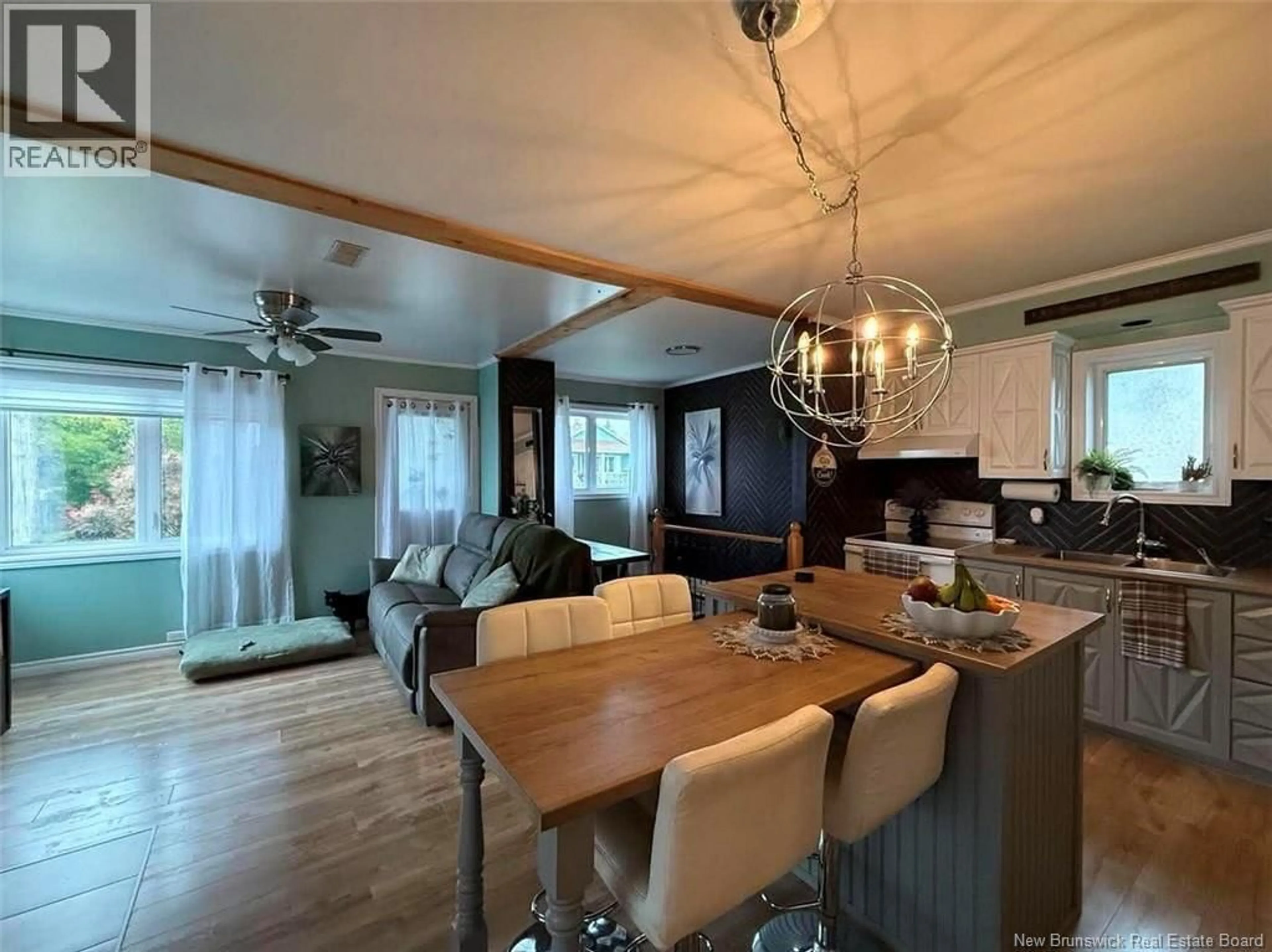 Open concept kitchen, wood/laminate floor for 129 34TH AVENUE, Edmundston New Brunswick E3V2T4