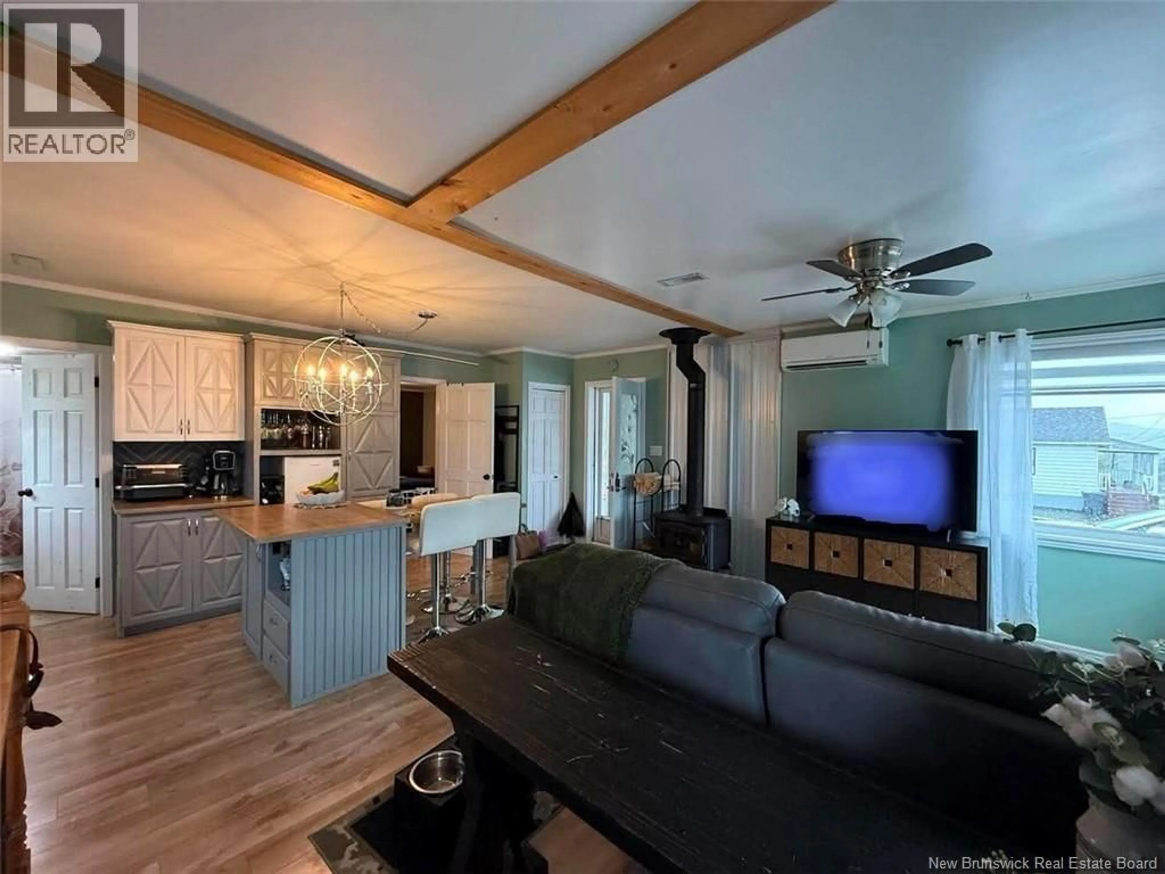 Open concept kitchen, wood/laminate floor for 129 34TH AVENUE, Edmundston New Brunswick E3V2T4