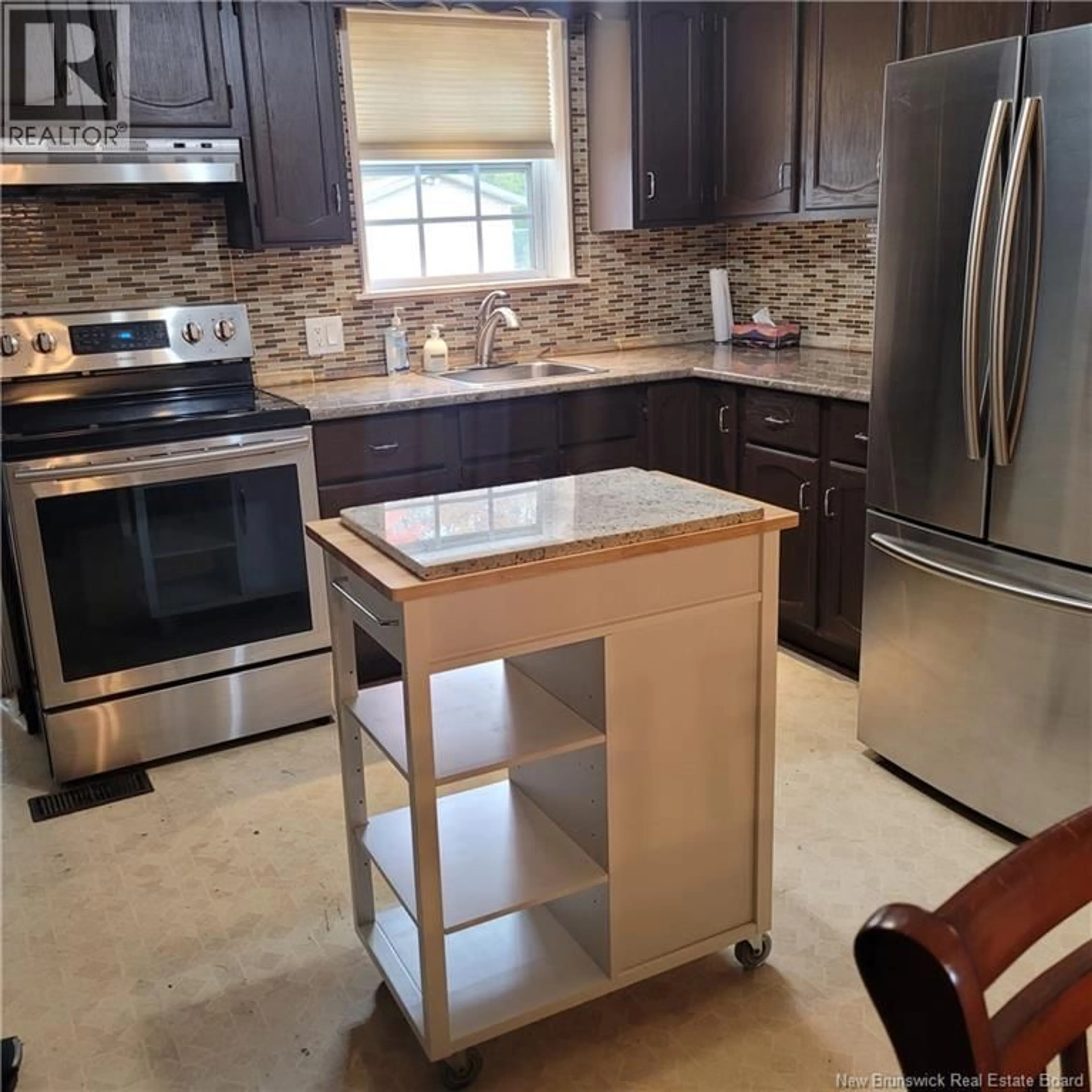Open concept kitchen, ceramic/tile floor for 543 CHAMPLAIN STREET, Dieppe New Brunswick E1A1P2