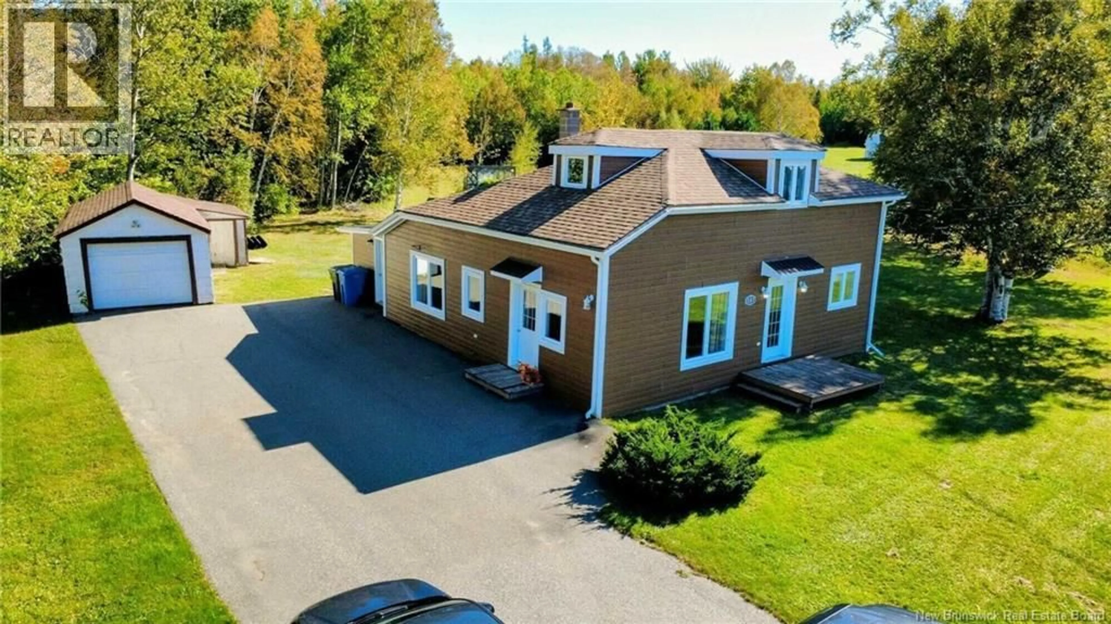 A pic from outside/outdoor area/front of a property/back of a property/a pic from drone, building for 507 BD DES ACADIENS BD, Bertrand New Brunswick E1W1G1