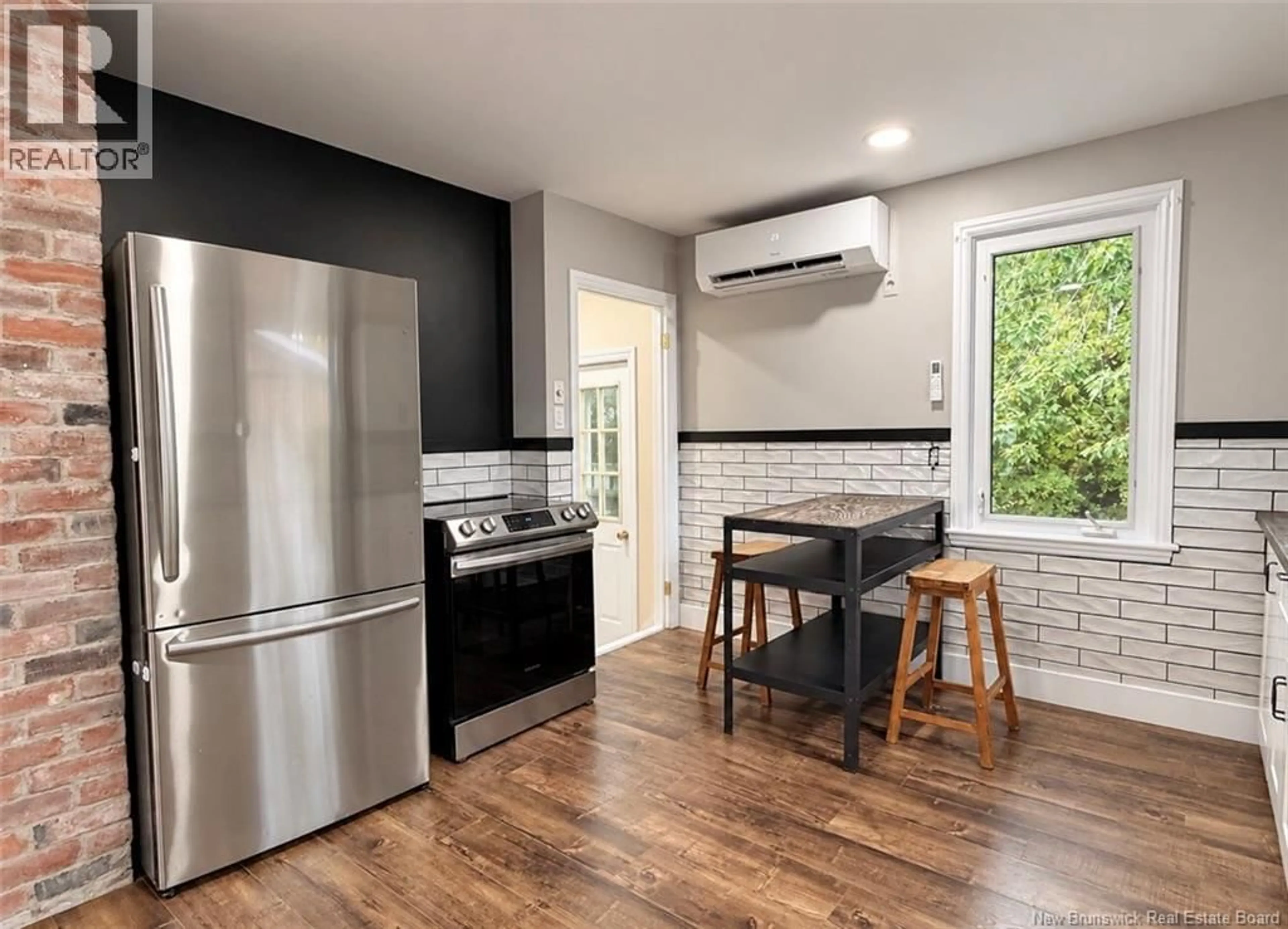 Open concept kitchen, ceramic/tile floor for 375 ST ANNE, Bathurst New Brunswick E2A2N3