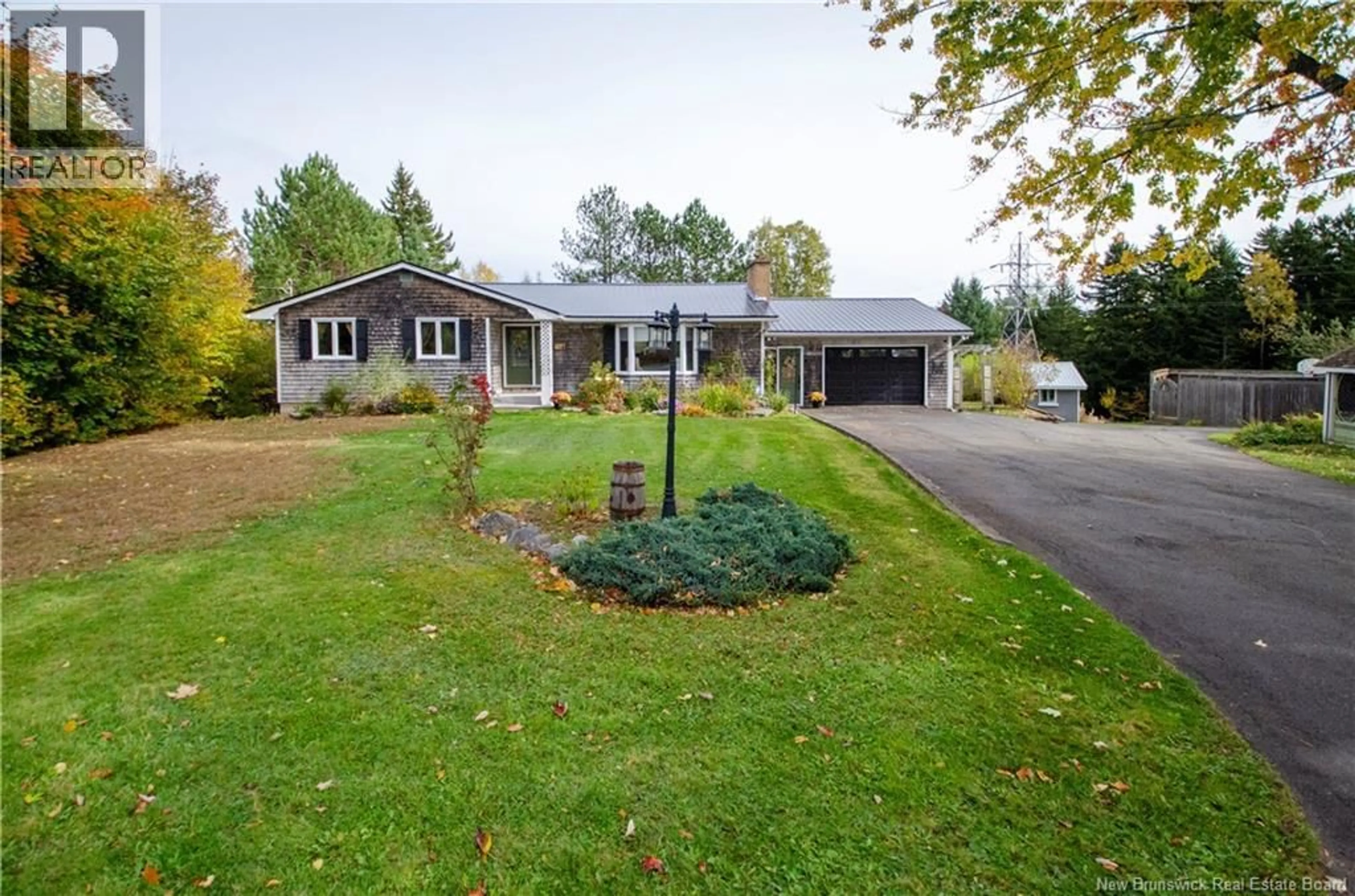 A pic from outside/outdoor area/front of a property/back of a property/a pic from drone, unknown for 16 SANDRA DRIVE, Quispamsis New Brunswick E2G1E7