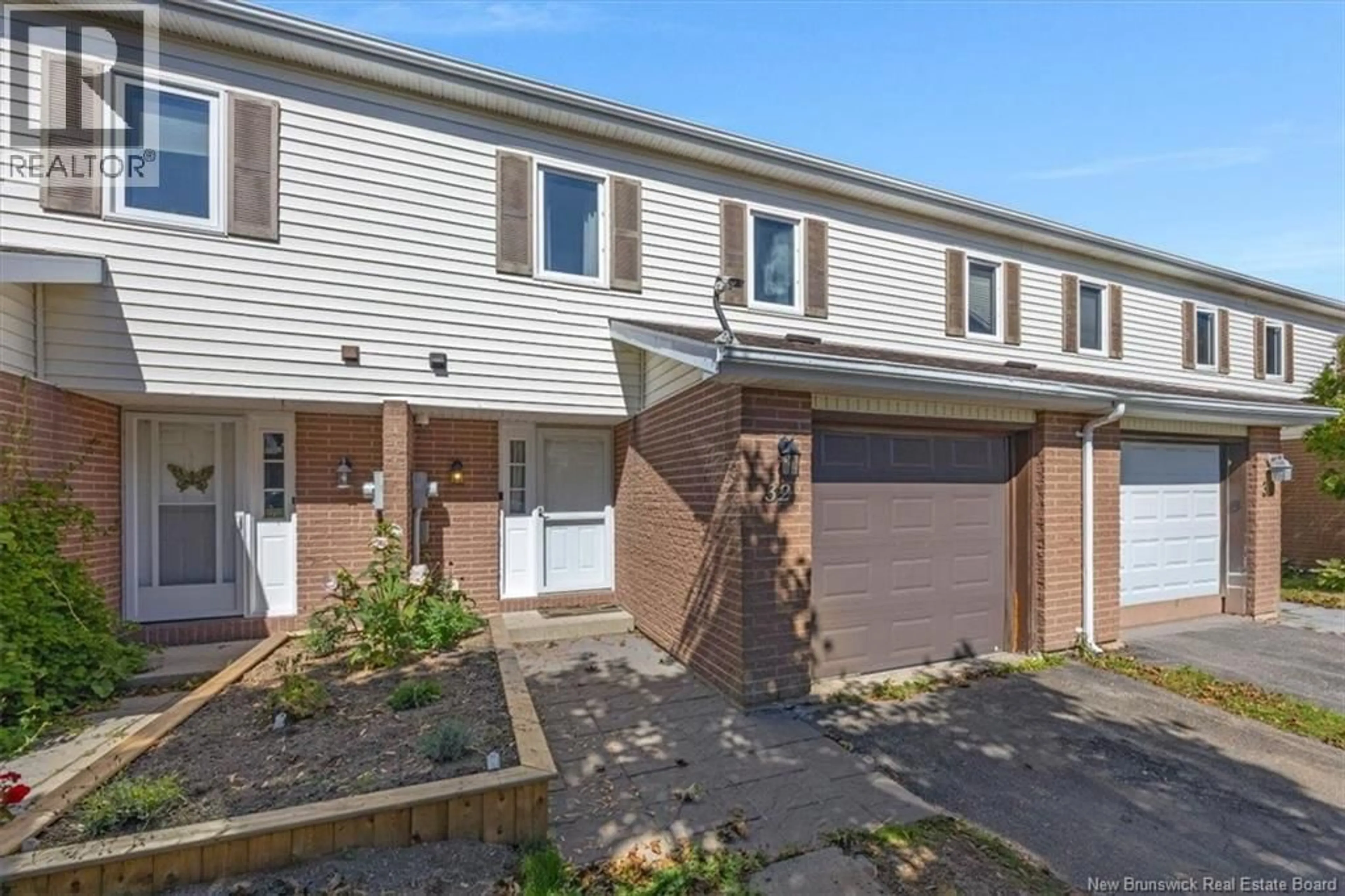 A pic from outside/outdoor area/front of a property/back of a property/a pic from drone, street for 32 DRIFTWOOD LANE, Saint John New Brunswick E2M5L5