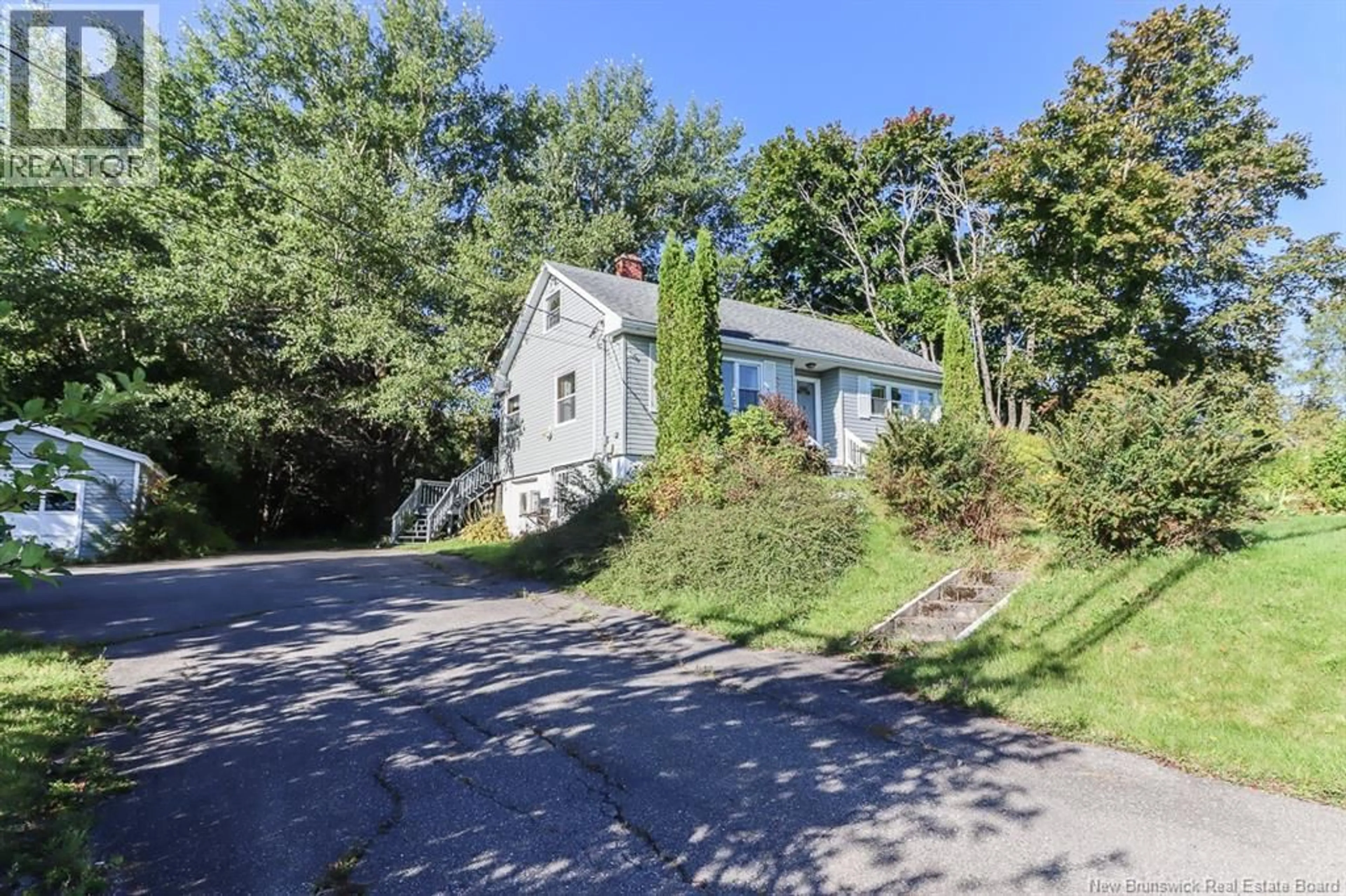 A pic from outside/outdoor area/front of a property/back of a property/a pic from drone, street for 1024 LORNEVILLE ROAD, Saint John New Brunswick E2M7G5