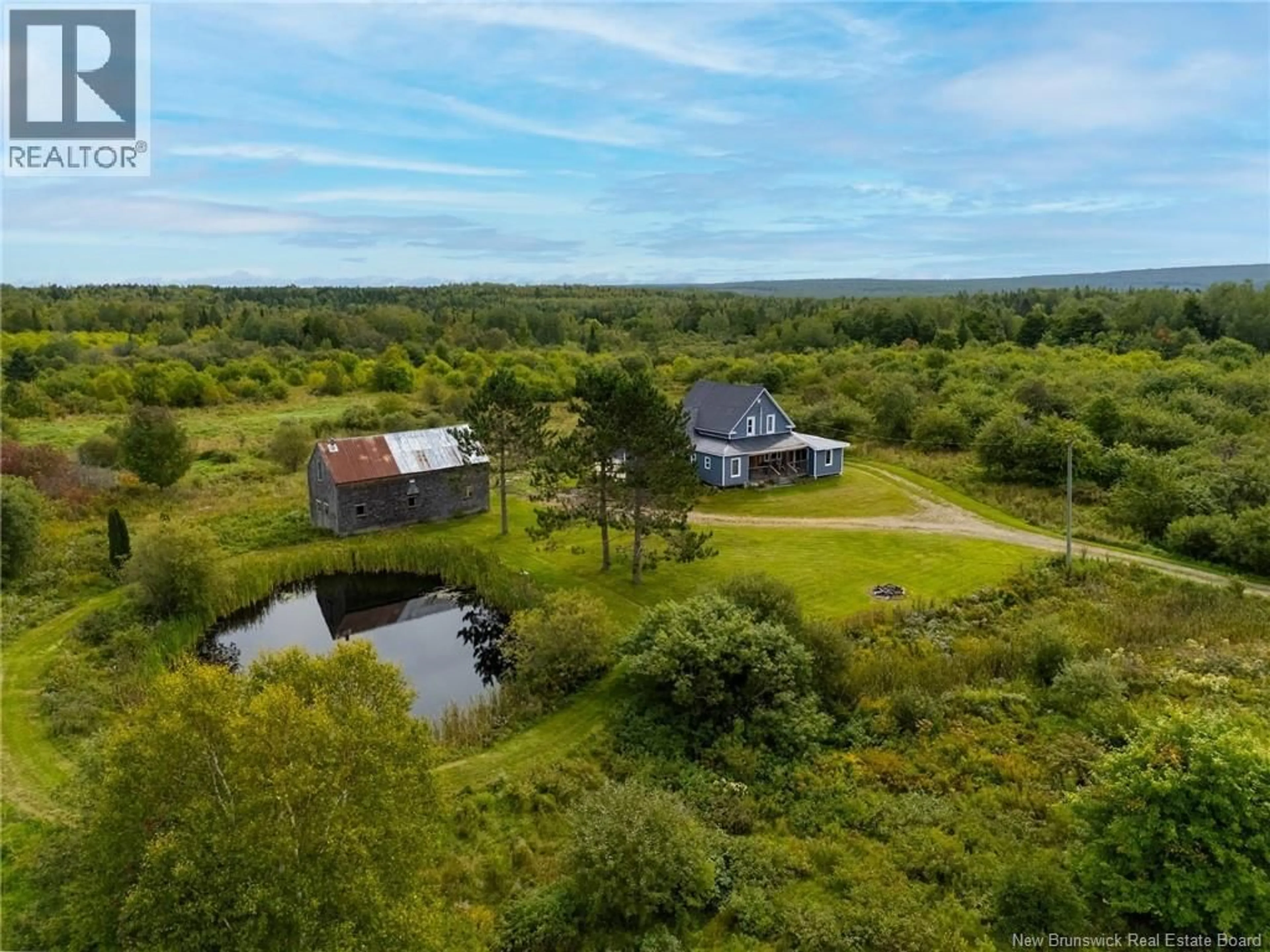 A pic from outside/outdoor area/front of a property/back of a property/a pic from drone, water/lake/river/ocean view for 4004 ROUTE 620, Tay Creek New Brunswick E6B1J8