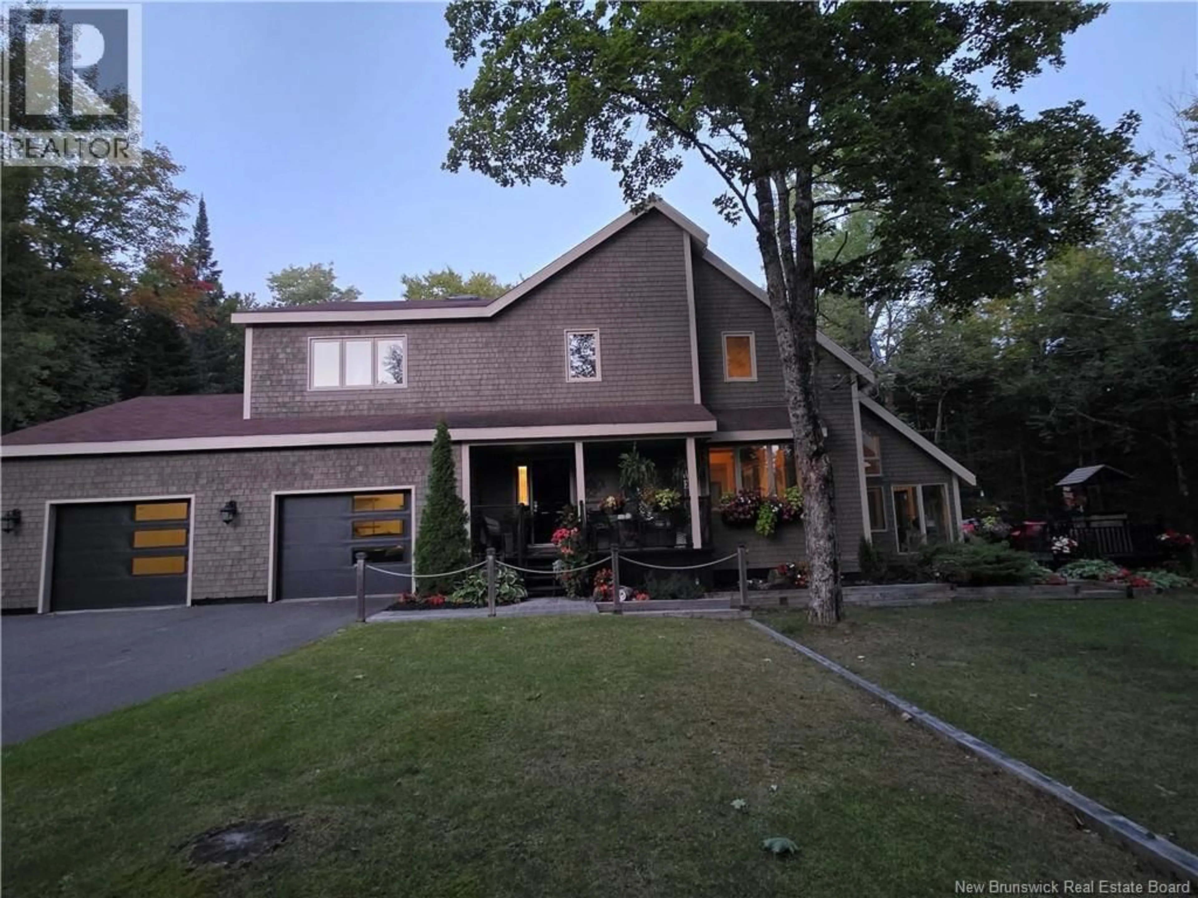 Home with vinyl exterior material, street for 352 DEERWOOD DRIVE, Hanwell New Brunswick E3E1C3