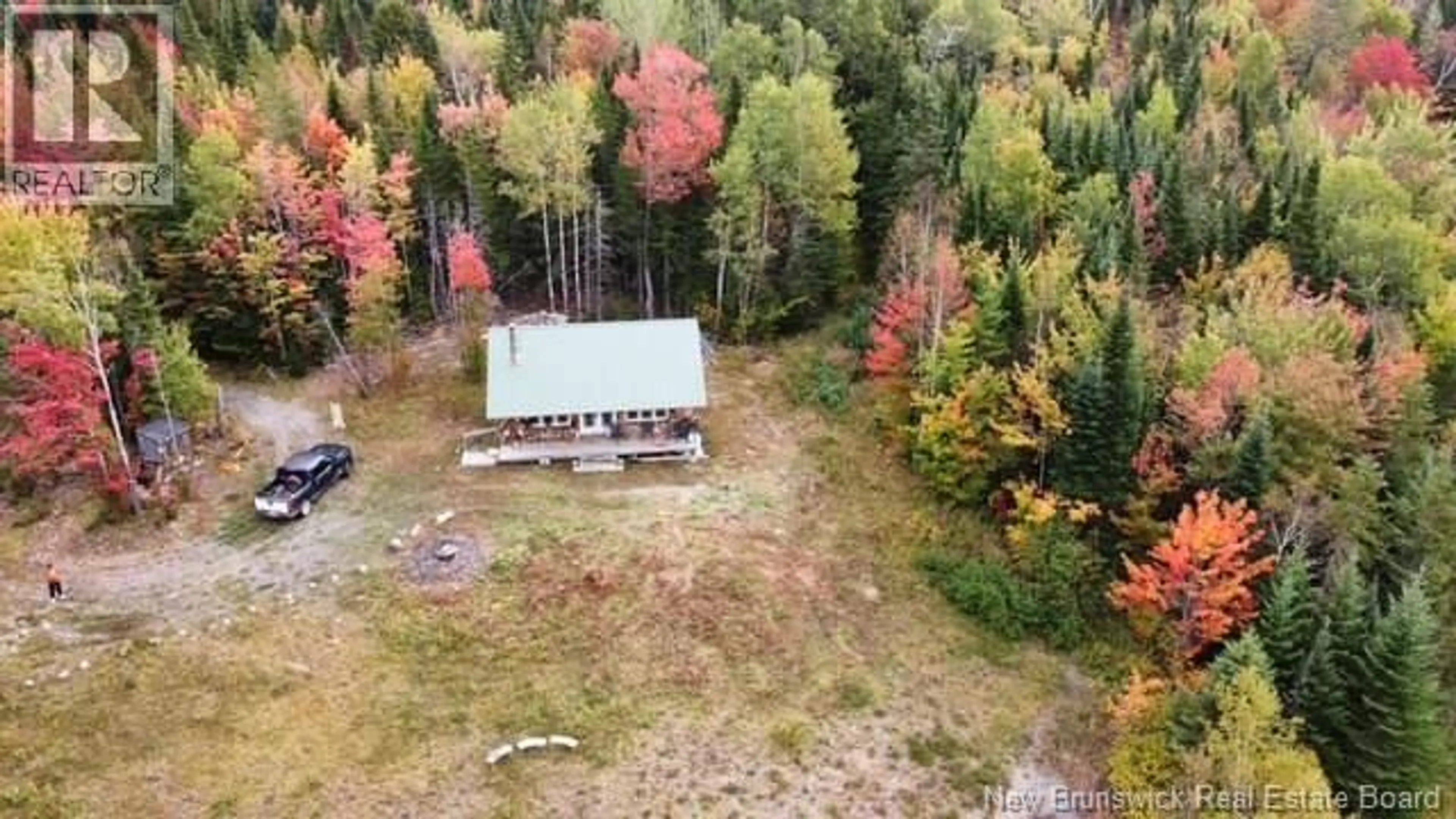 A pic from outside/outdoor area/front of a property/back of a property/a pic from drone, forest/trees view for CAMP KITCHEN SETTLEMENT ROAD, Prince William New Brunswick E6K3P9