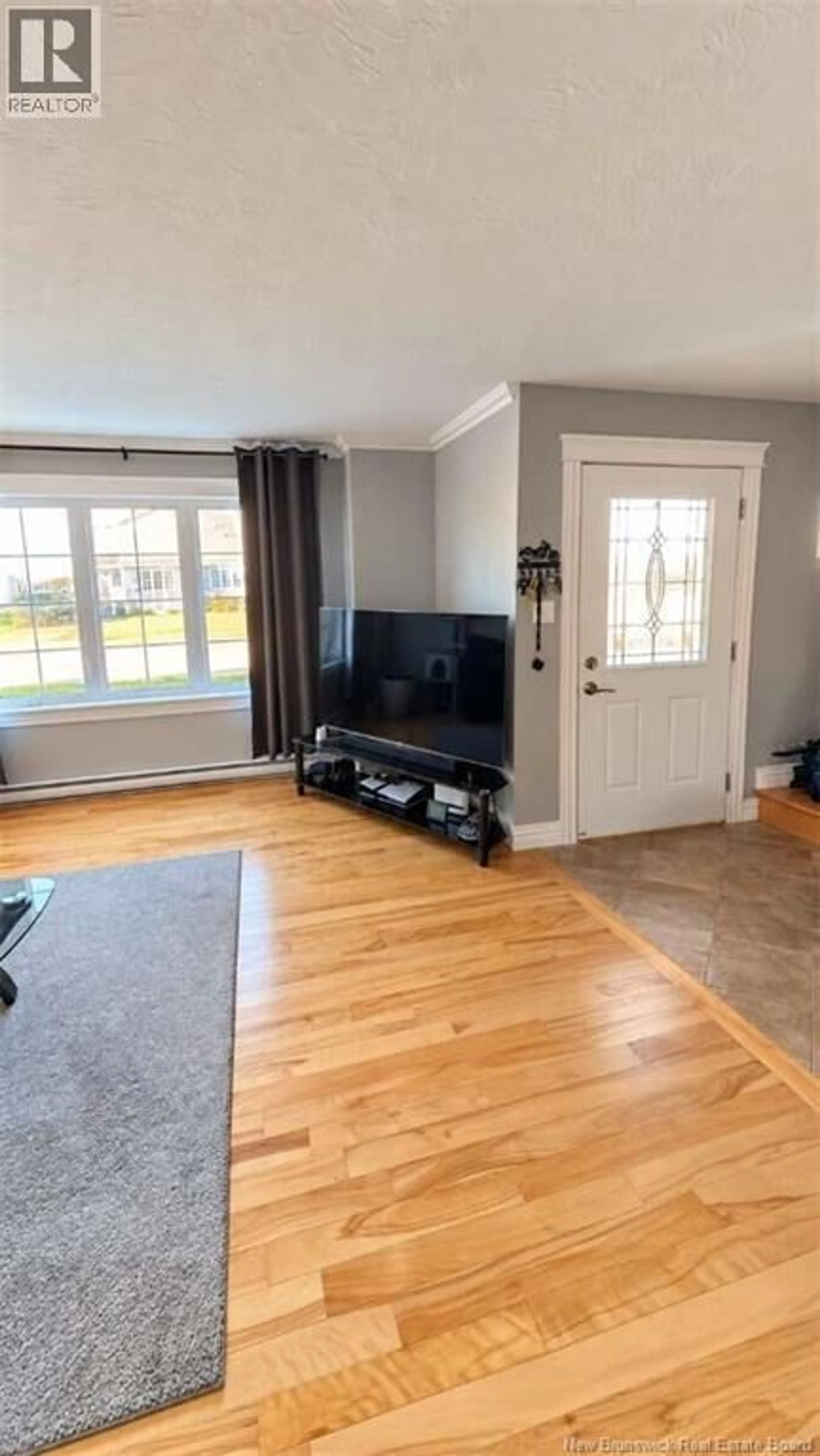 Living room with furniture, unknown for 22 COACHMEN STREET, Riverview New Brunswick E1B0J7