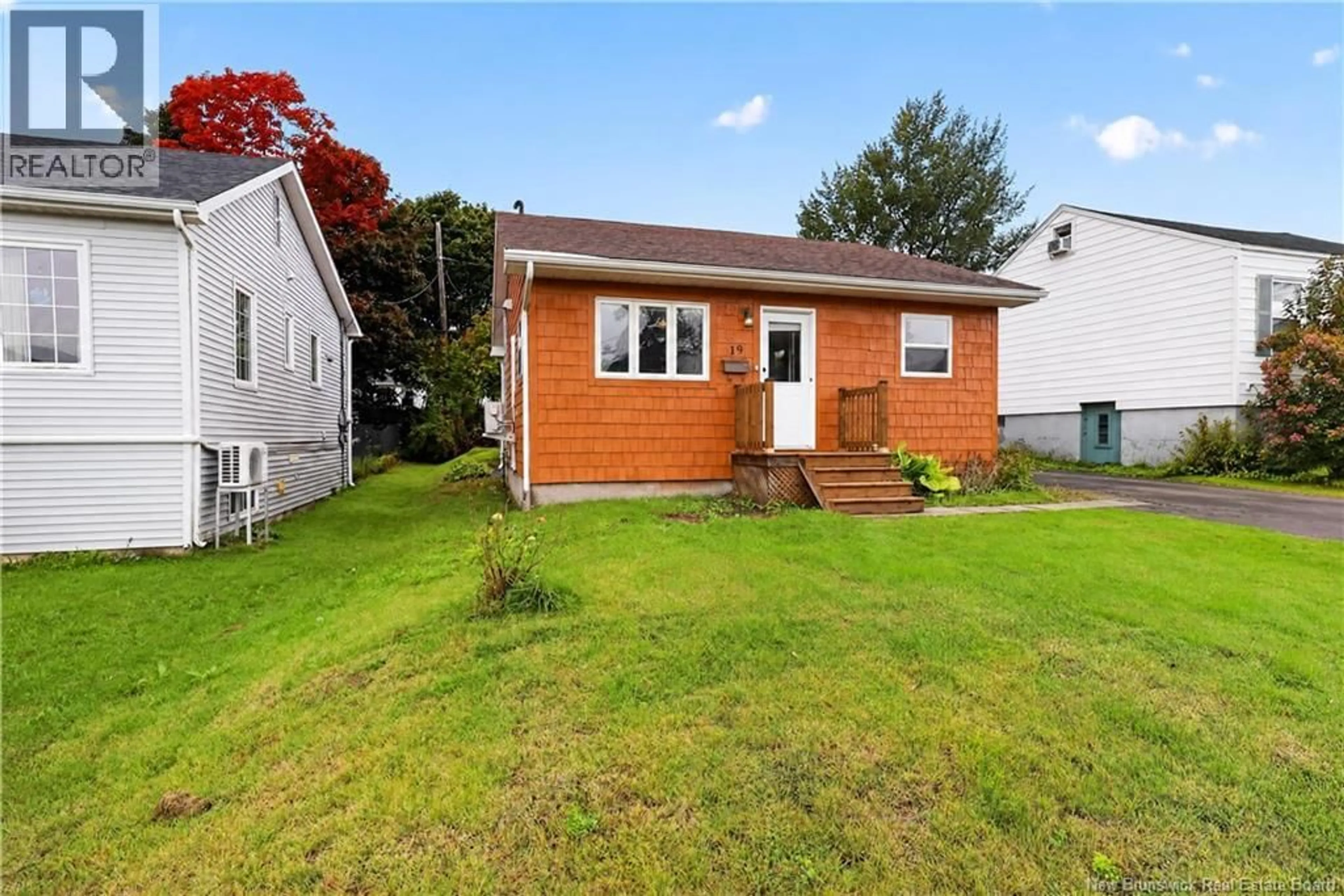 Home with vinyl exterior material, street for 19 COPP STREET, Dieppe New Brunswick E1A2G9