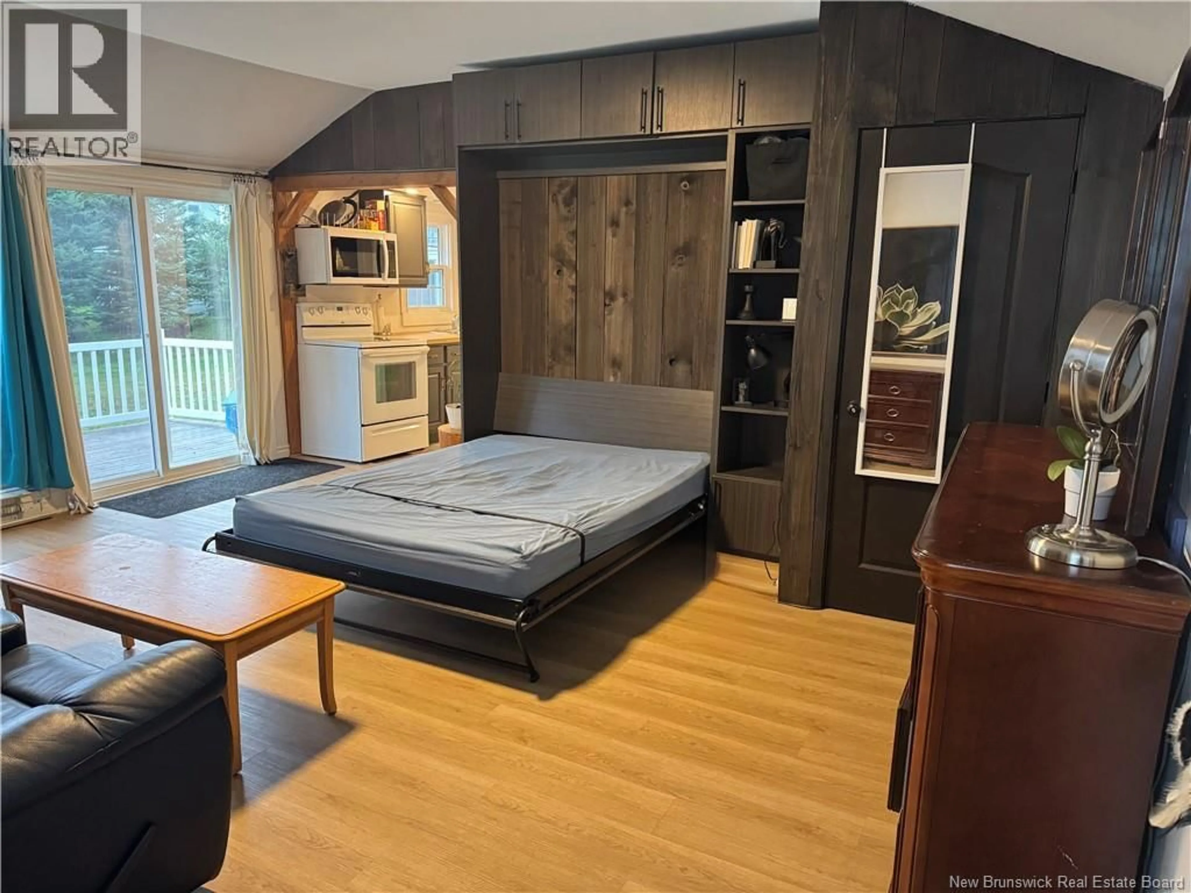 Bedroom with bed, wood/laminate floor for 23 SUNSET LANE, Pointe-Du-Chêne New Brunswick E4P5H2