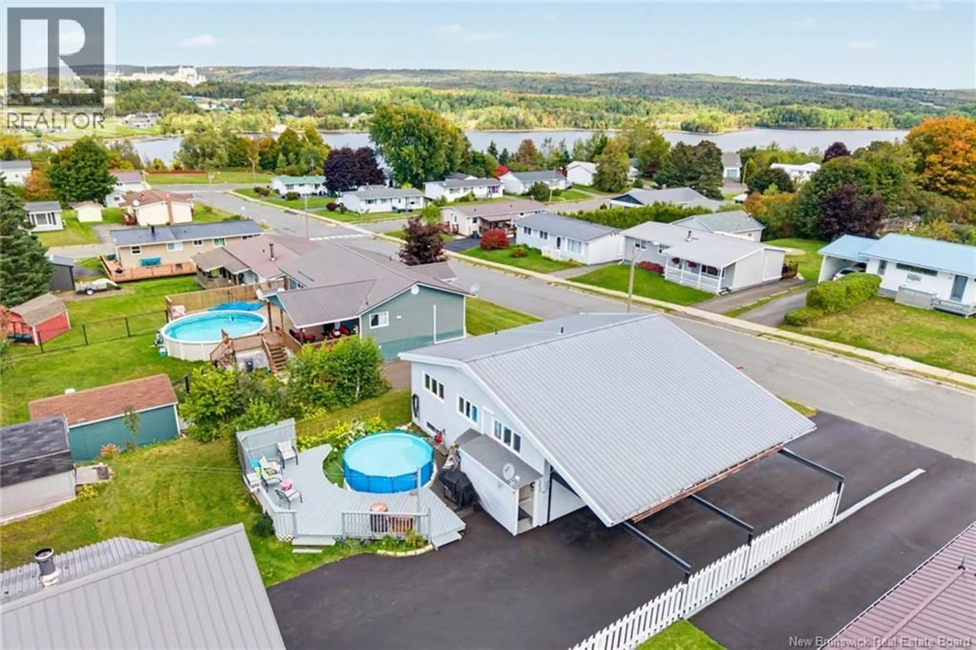 A pic from outside/outdoor area/front of a property/back of a property/a pic from drone, unknown for 23 HARDING DRIVE, Nackawic New Brunswick E6G1C1
