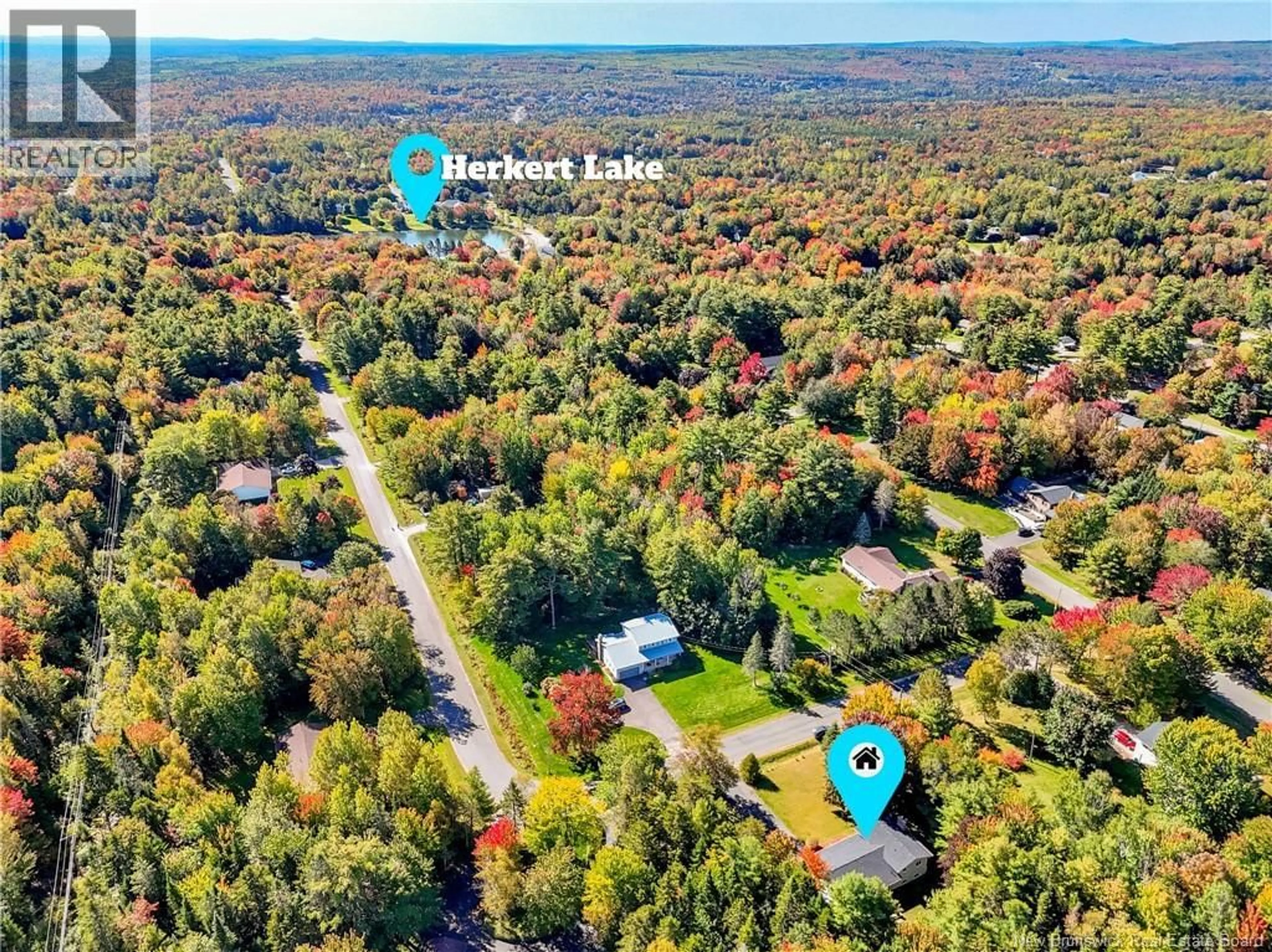 A pic from outside/outdoor area/front of a property/back of a property/a pic from drone, water/lake/river/ocean view for 9 NEPTUNE CRESCENT, Hanwell New Brunswick E3C1M7