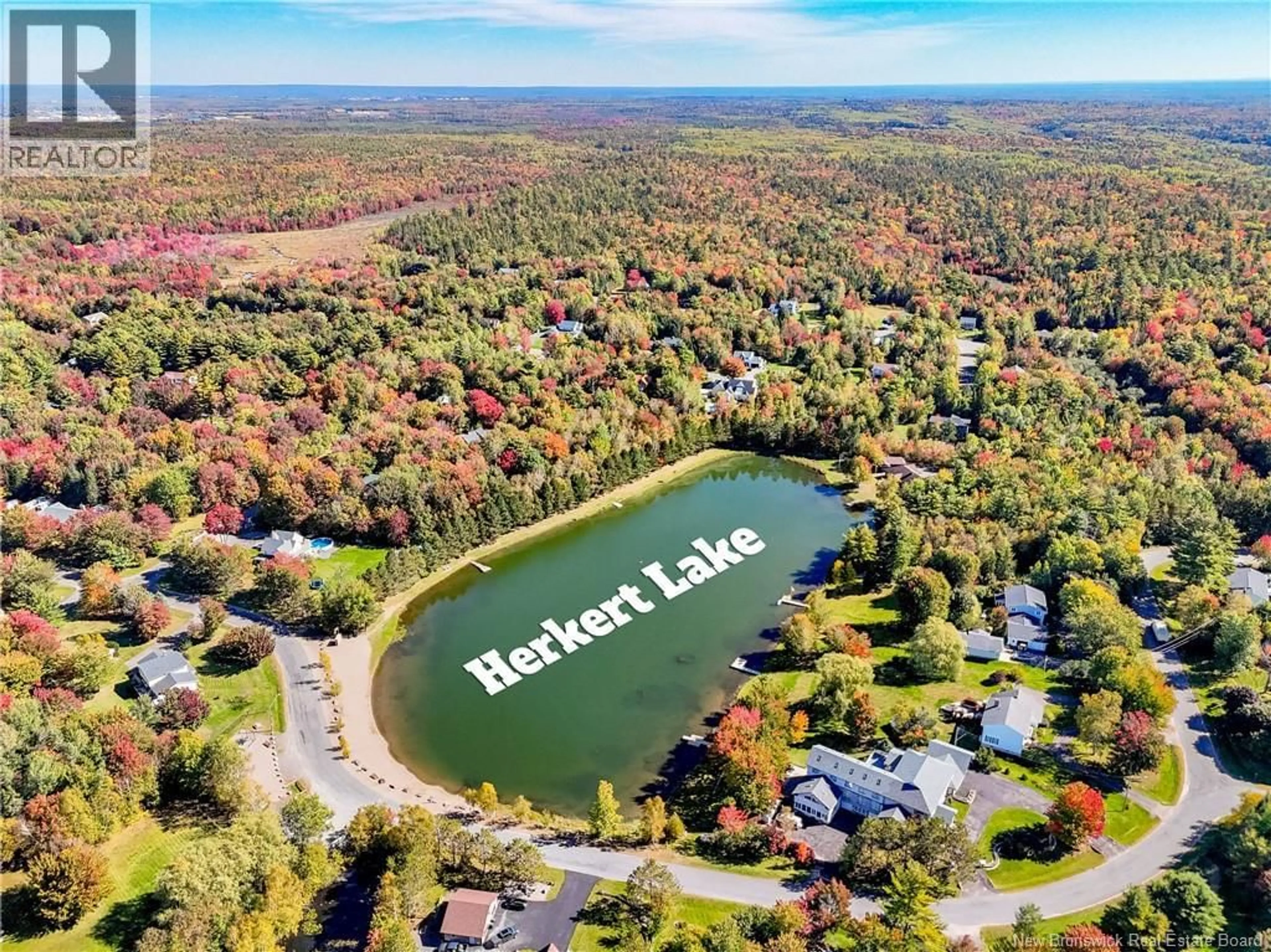 A pic from outside/outdoor area/front of a property/back of a property/a pic from drone, water/lake/river/ocean view for 9 NEPTUNE CRESCENT, Hanwell New Brunswick E3C1M7