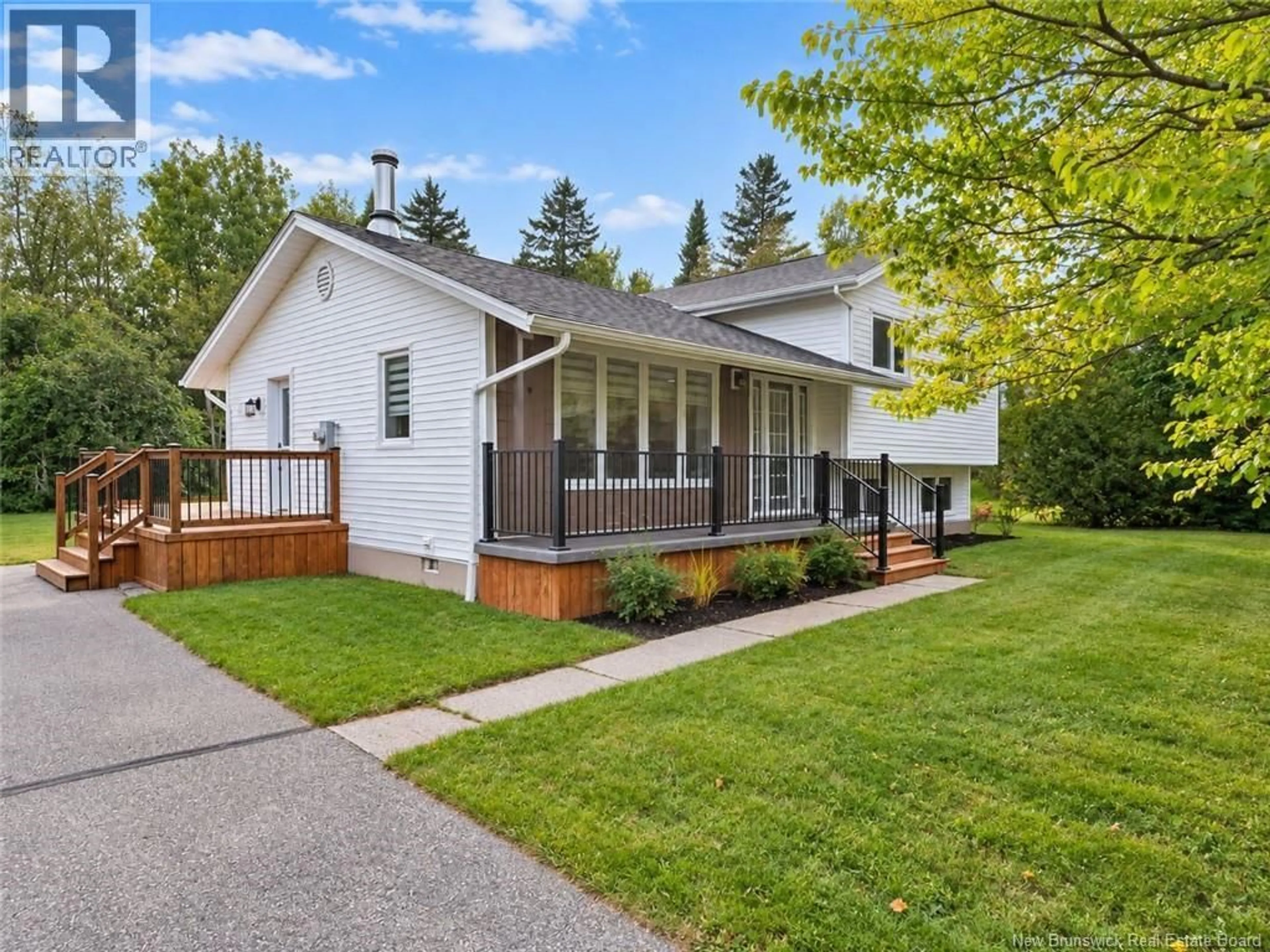 Home with vinyl exterior material, street for 656 SUREAU BLANC, Tracadie New Brunswick E1X4T9