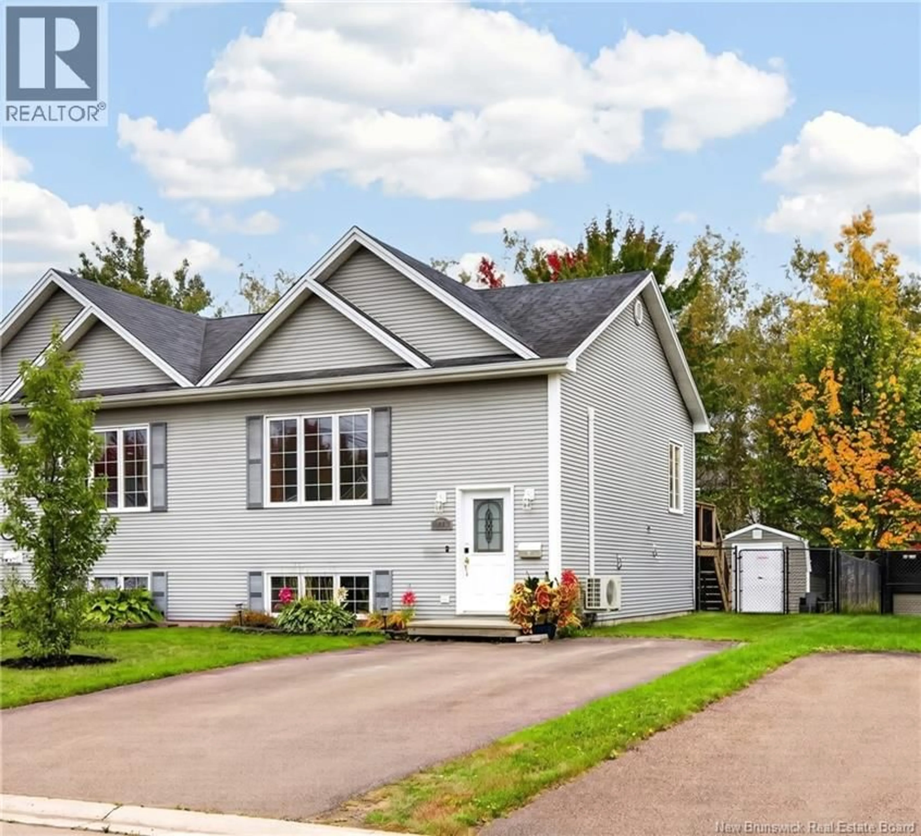 Home with vinyl exterior material, street for 72 DEVARENNE STREET, Dieppe New Brunswick E1A0C8