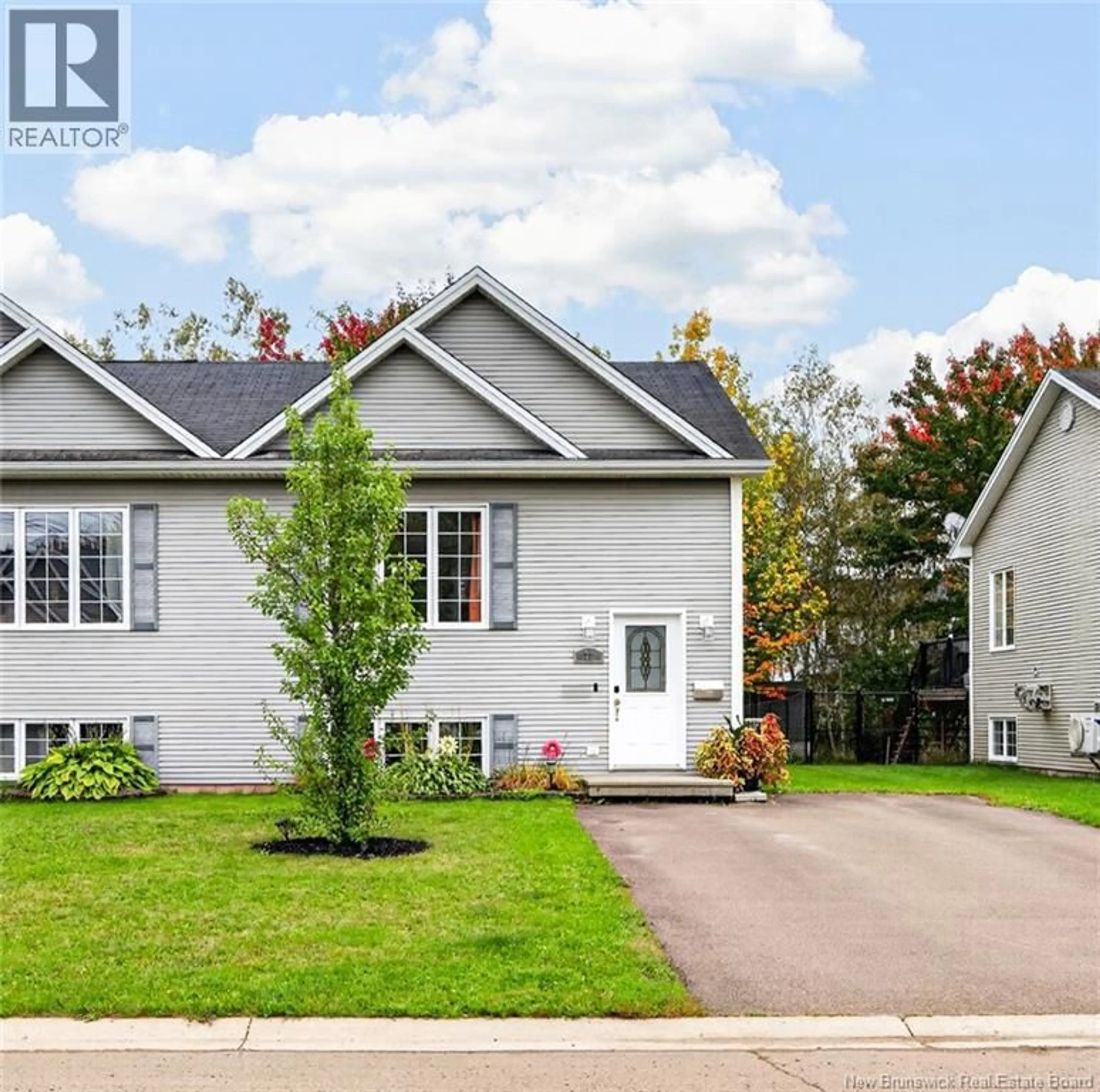 Home with vinyl exterior material, street for 72 DEVARENNE STREET, Dieppe New Brunswick E1A0C8