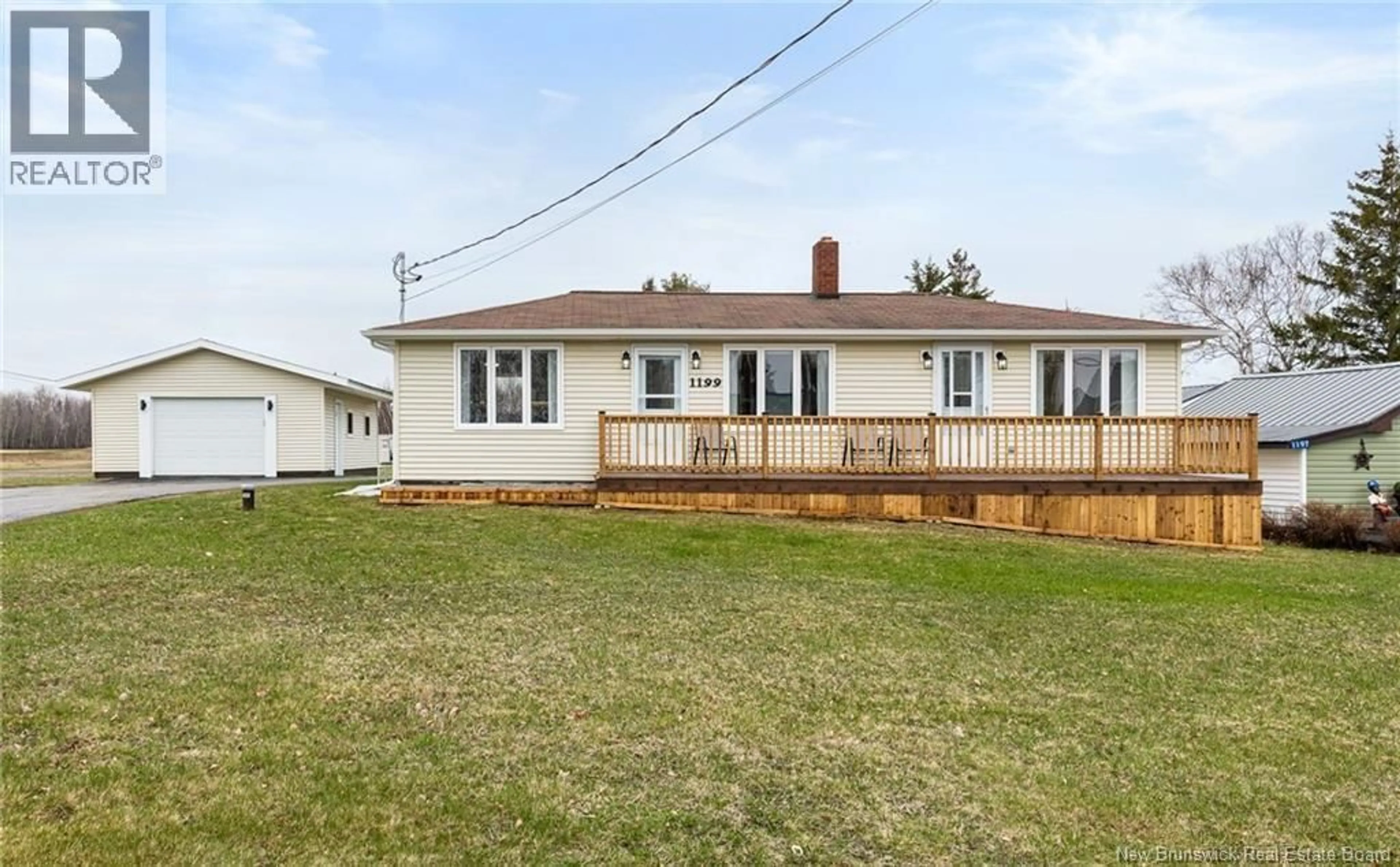 A pic from outside/outdoor area/front of a property/back of a property/a pic from drone, street for 1199 ROUTE 133 ROAD, Grand-Barachois New Brunswick E4P8C5