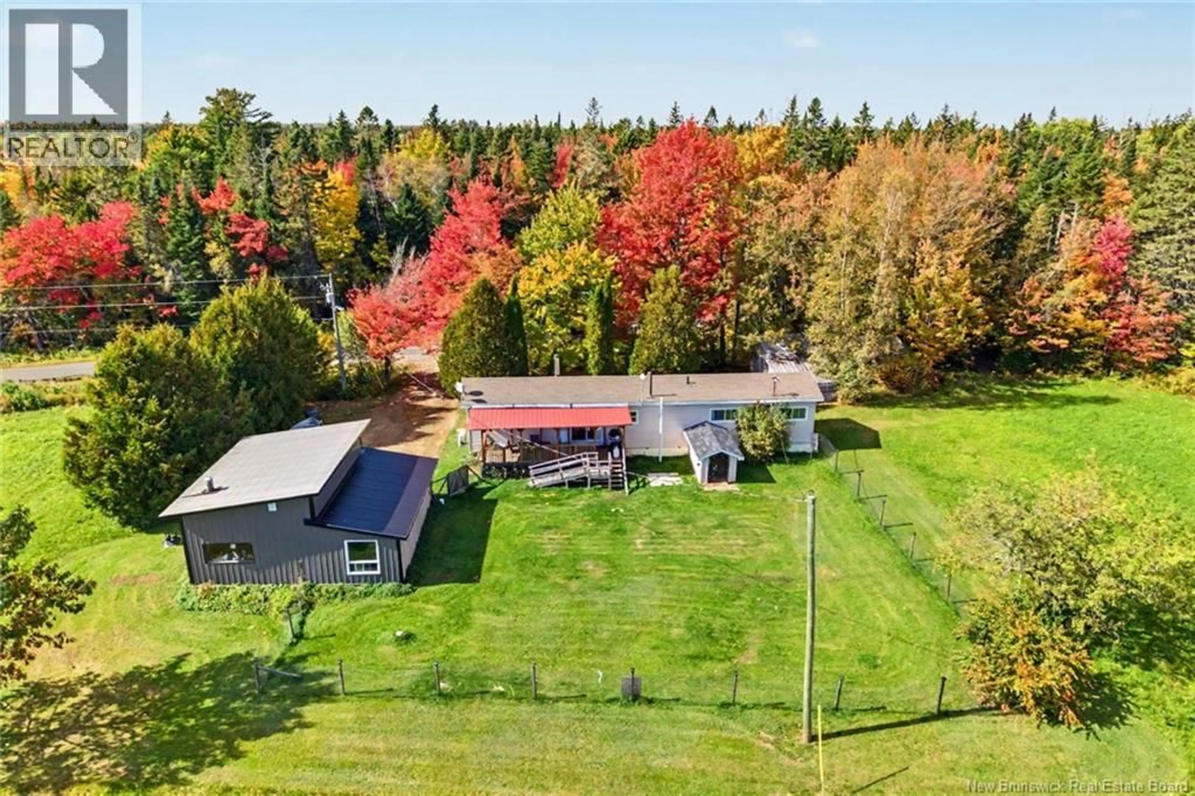 A pic from outside/outdoor area/front of a property/back of a property/a pic from drone, unknown for 370 MIDLAND ROAD, Midland New Brunswick E4A1V5