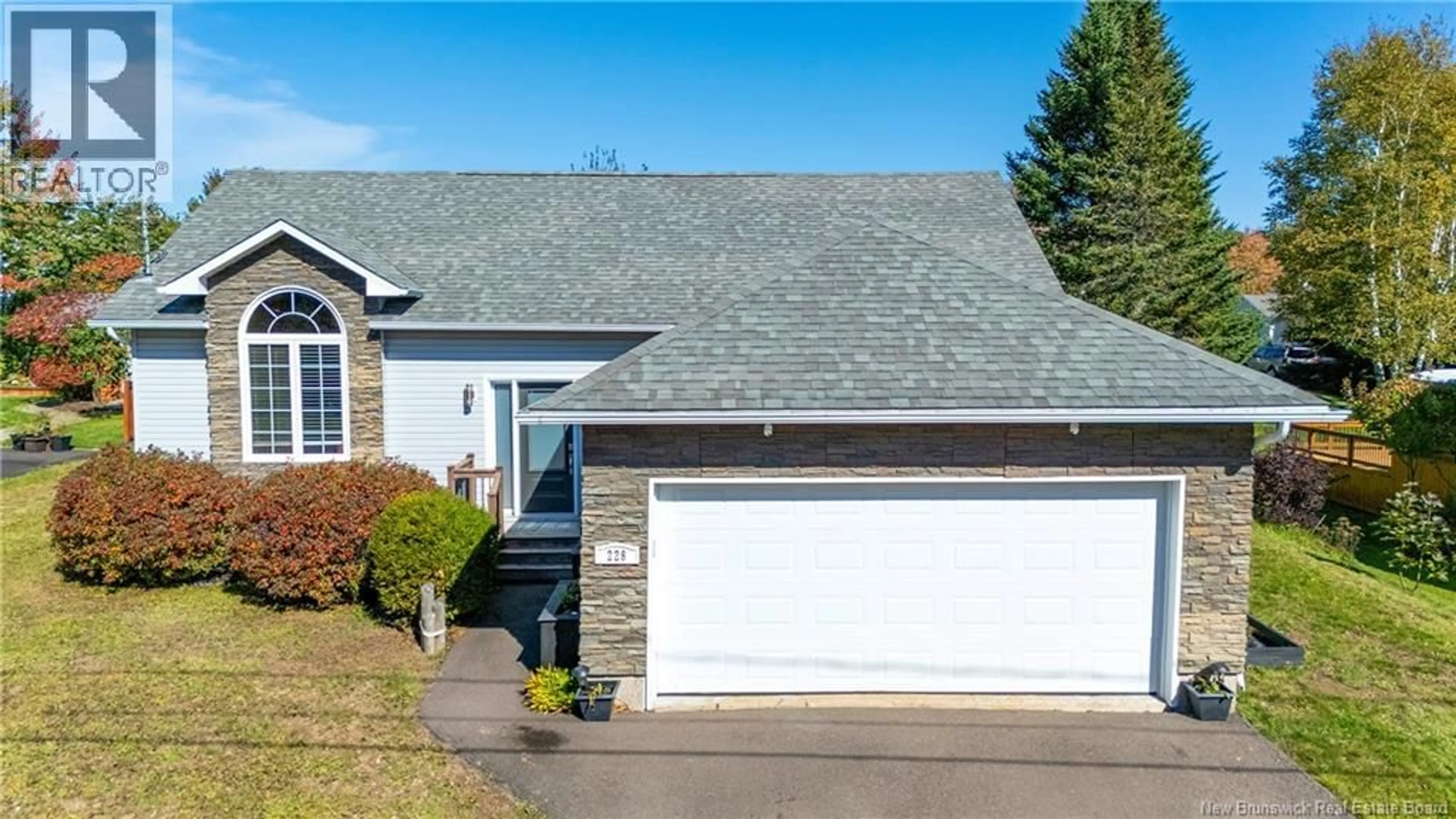 Home with vinyl exterior material, street for 228 HERVE STREET, Dieppe New Brunswick E1A6Y7
