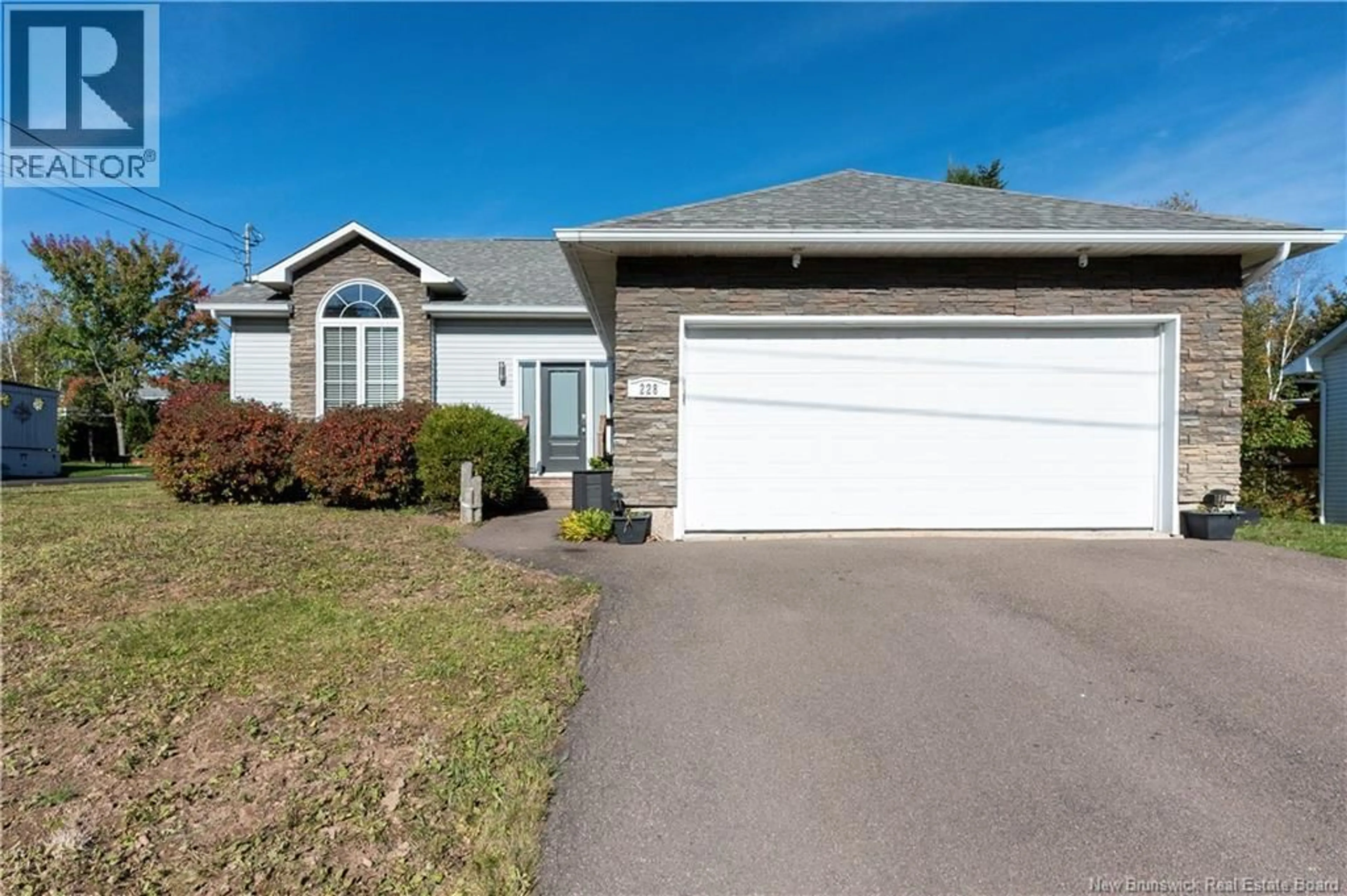Home with vinyl exterior material, street for 228 HERVE STREET, Dieppe New Brunswick E1A6Y7