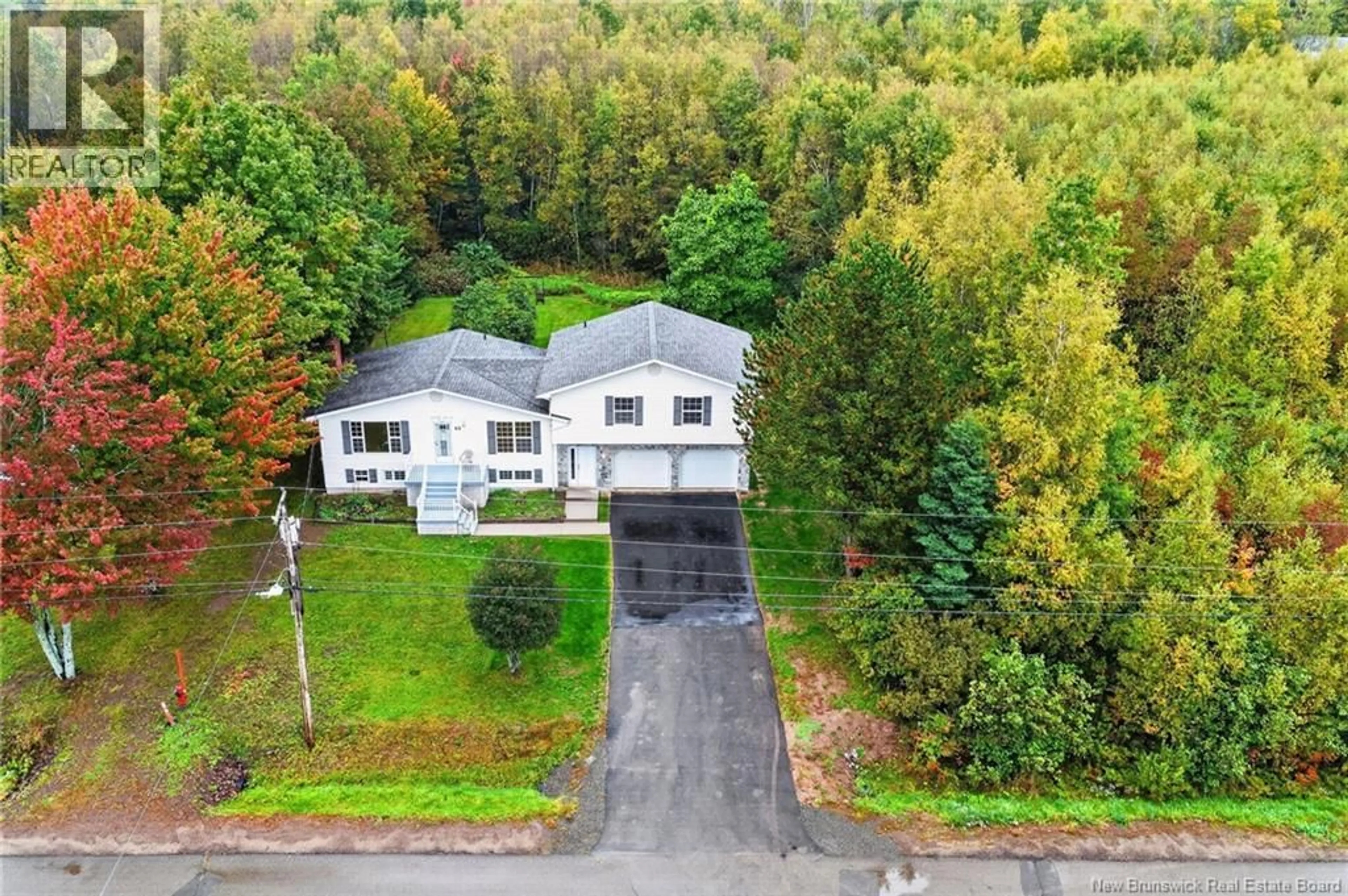 A pic from outside/outdoor area/front of a property/back of a property/a pic from drone, street for 65 NORTHWOOD ROAD, Moncton New Brunswick E1G2K8
