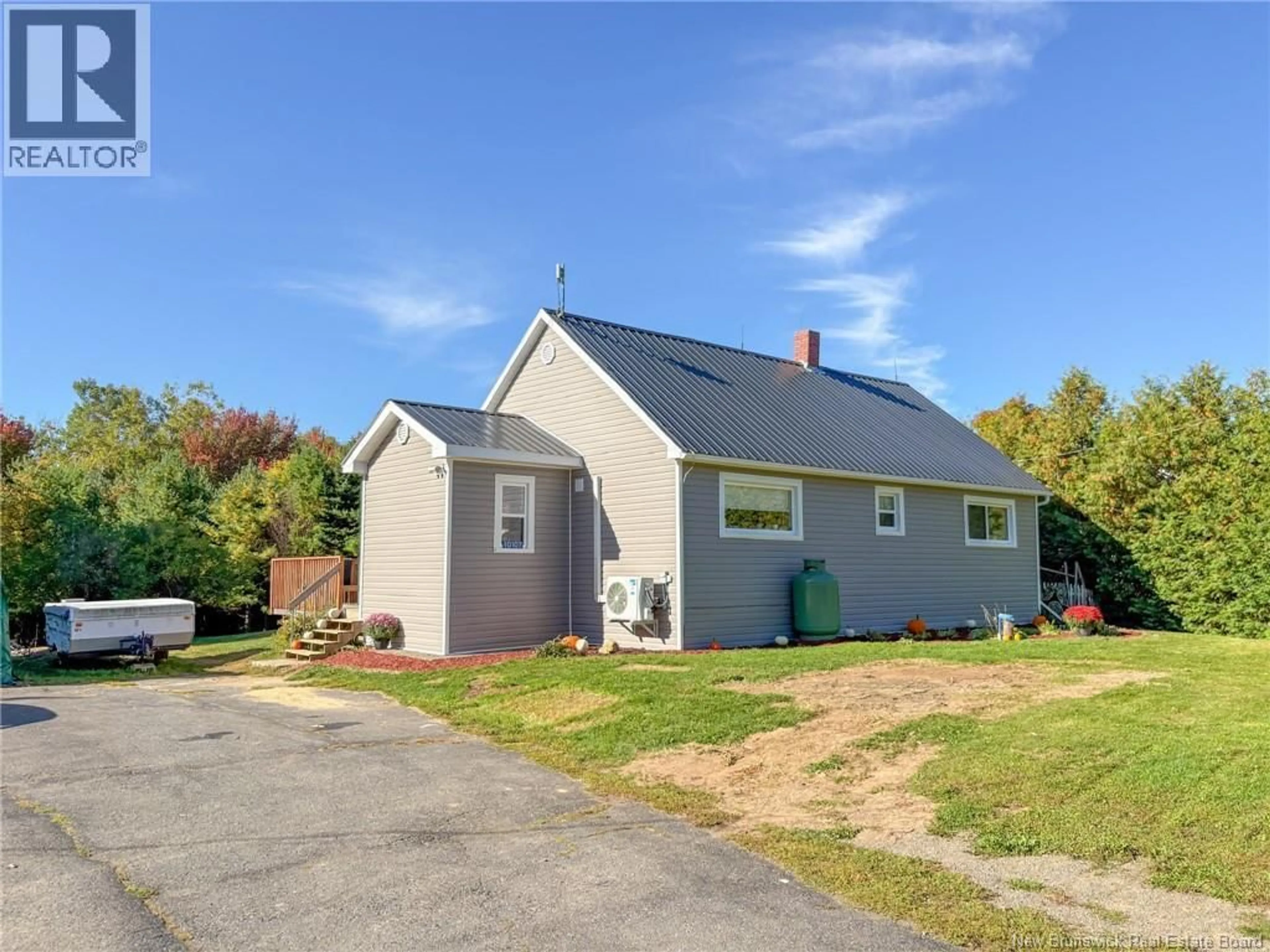 Home with vinyl exterior material, street for 10107 ROUTE 105, Beechwood New Brunswick E7J2A5
