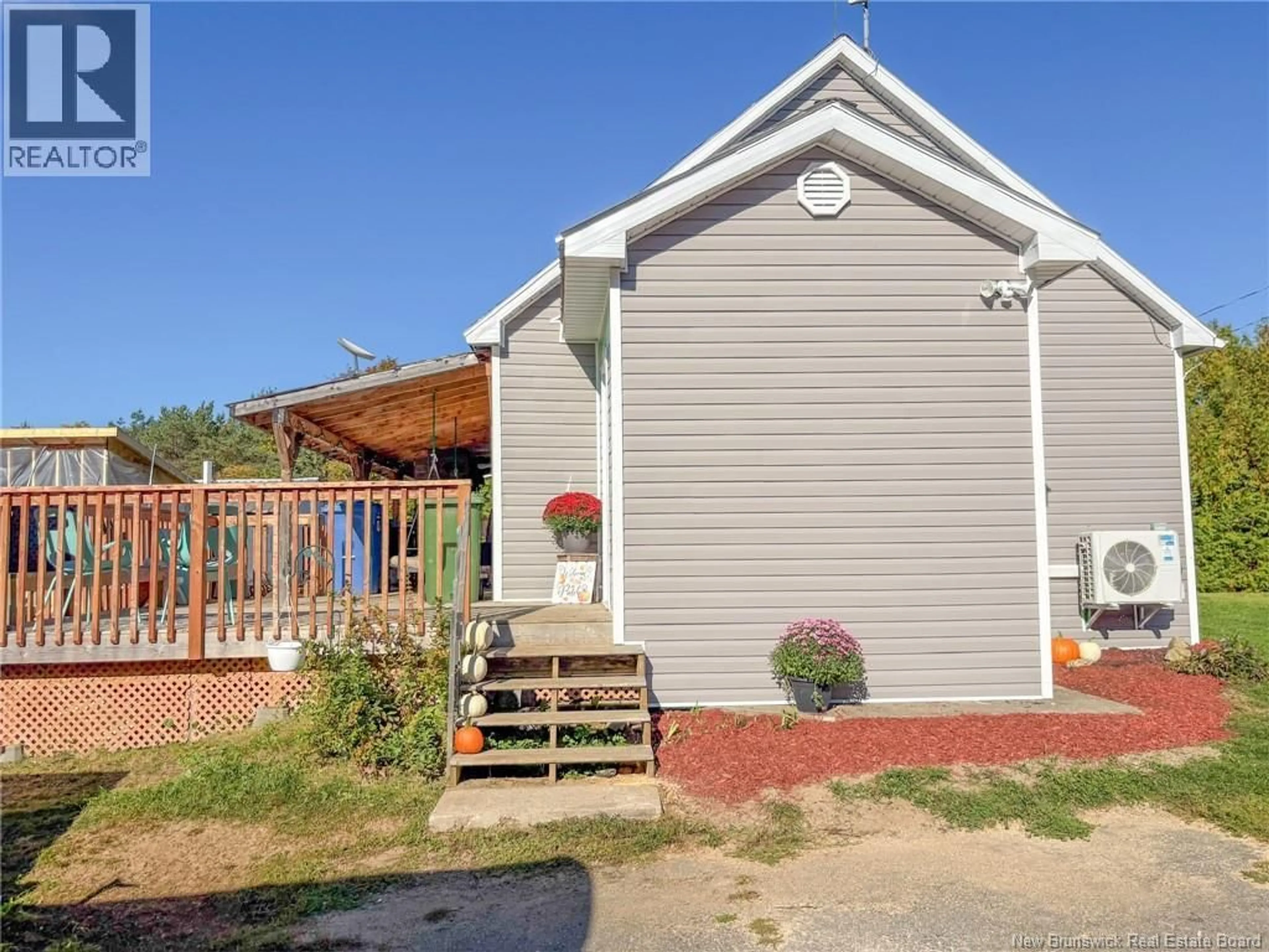 Home with vinyl exterior material, street for 10107 ROUTE 105, Beechwood New Brunswick E7J2A5